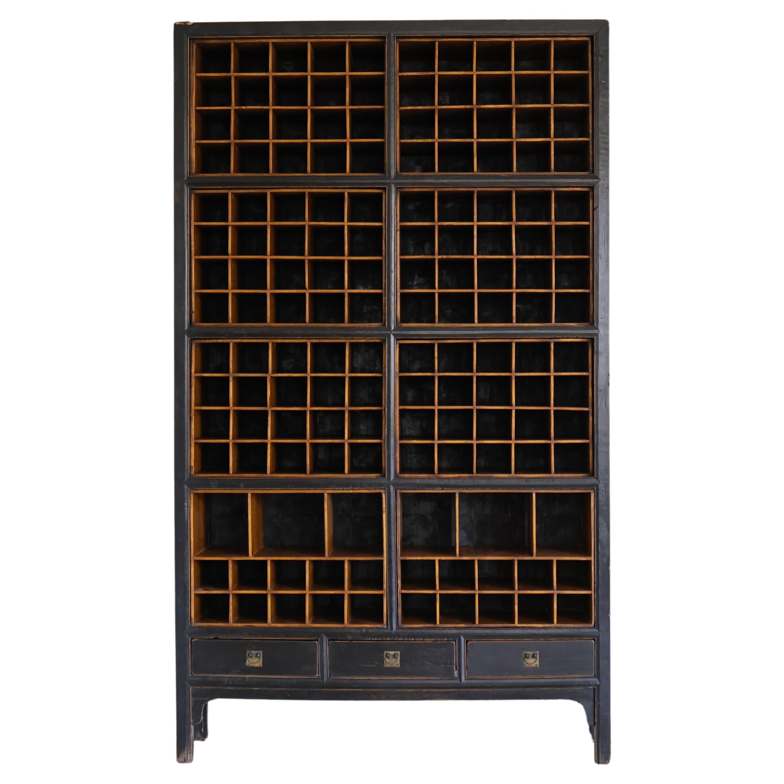 Vintage Towering Black Lacquered Salvaged Organizer/Apothecary Cabinet en vente