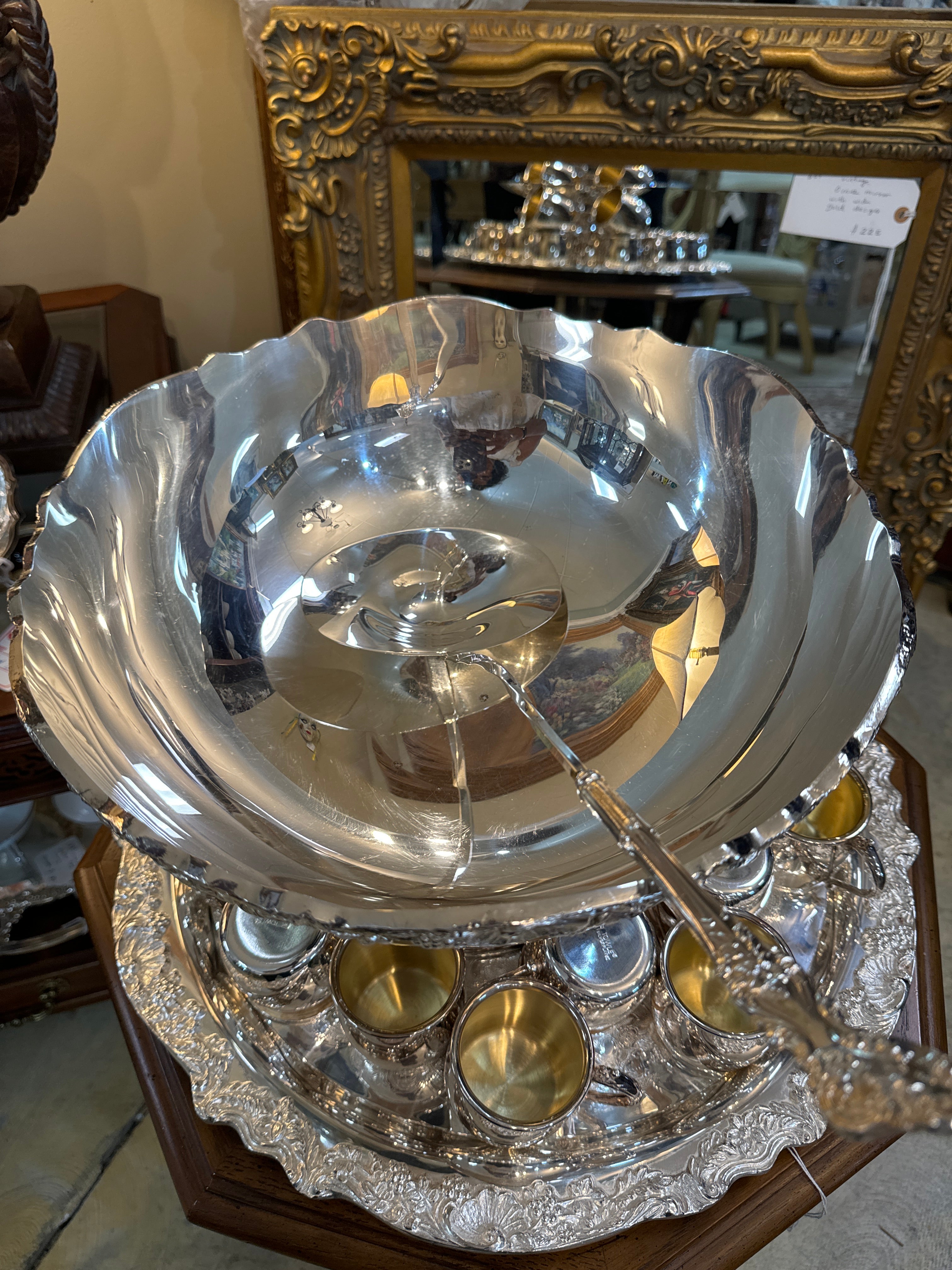 Absolute Beautiful Towle Silver-plate Punch Bowl Set, including Bunch bowl, Tray, Ladle & 20 cups., 23 pieces.

The punch bowl, and ladle are made of highly quality metal and silver plating but I kind find any marking on both., but the pattern