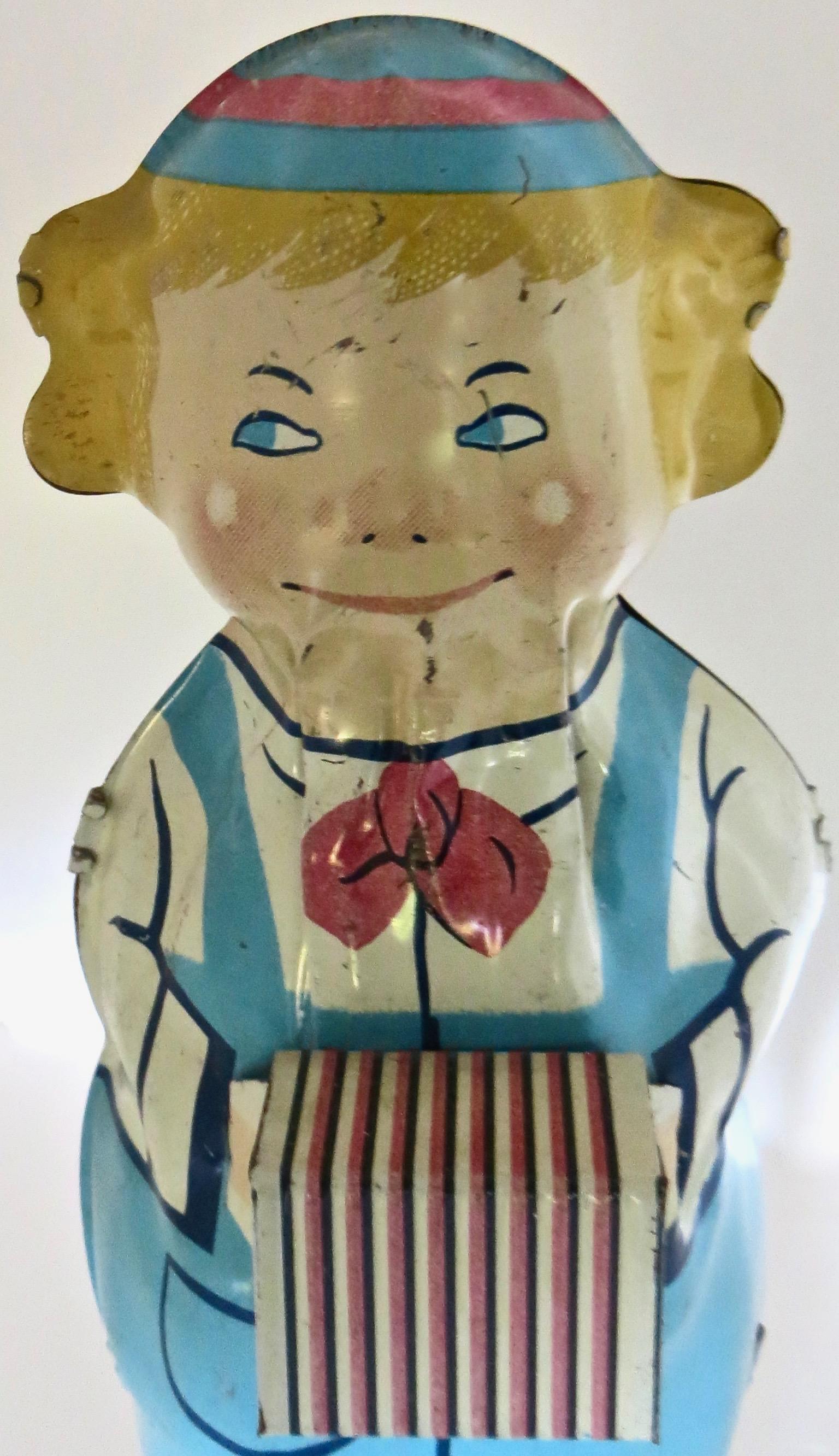 Metalwork Vintage Toy by Lindstrom Dancing Dutch Boy Playing Accordion American Circa 1930 For Sale