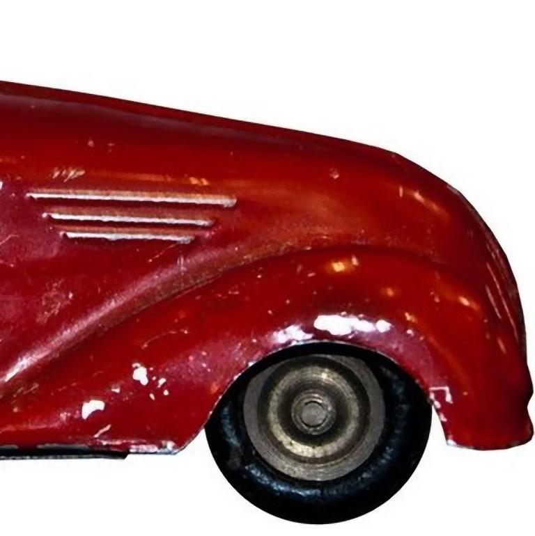 Vintage Spielzeugauto:: aufziehbares rotes Auto:: frühes 20 (Deutsch) im Angebot