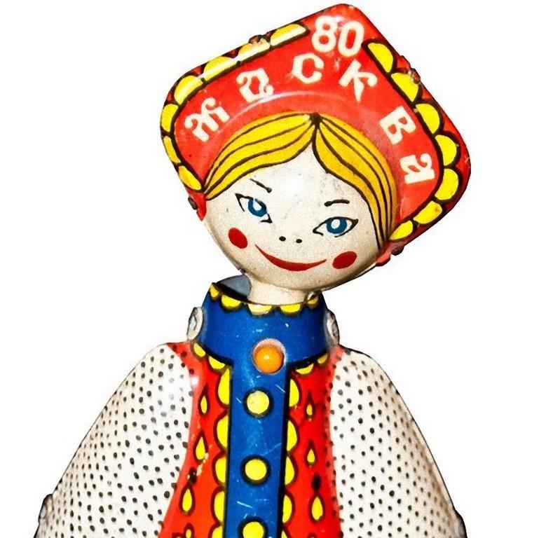 This Dancing Russian Doll - Moscow Olympics 1980 is a Vintage mechanical toy produced in Russia for the 1980 Olympic Games.

Dancing Russian Doll in painted tin and plastic.
Perfectly working, no original key.
Very good conditions.

This