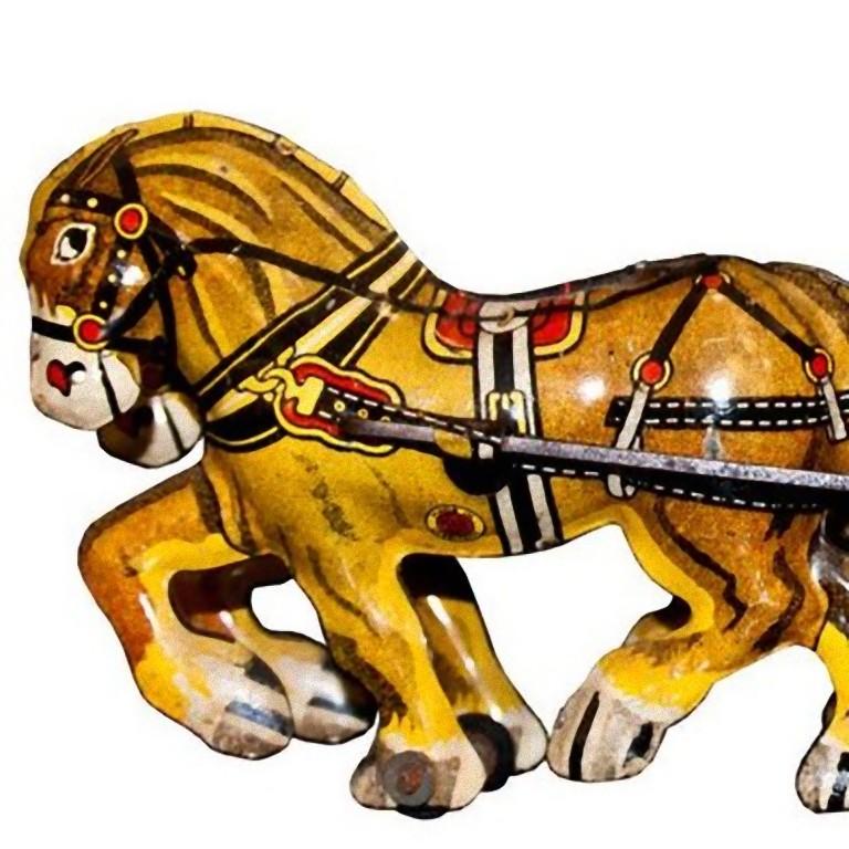 This Marx Toys Wind up Chariot and Horses is a vintage mechanical toy representing a red chariot dragged by two painted tin horses.

Original key not included.
Made by the famous American company Marx Toys (1919-1980).
Very good conditions