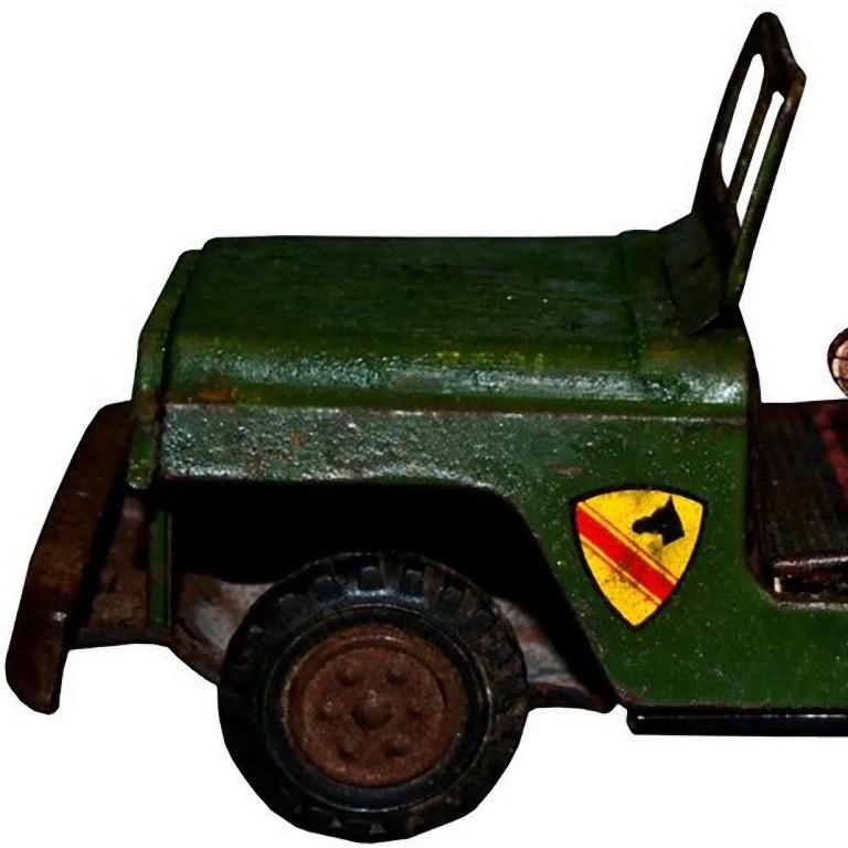 This Military Jeep is a vintage toy representing a military jeep and a driver.

Made in plastic and tin.
Not in perfect conditions.

This object is shipped from Italy. Under existing legislation, any object in Italy created over 70 years ago by