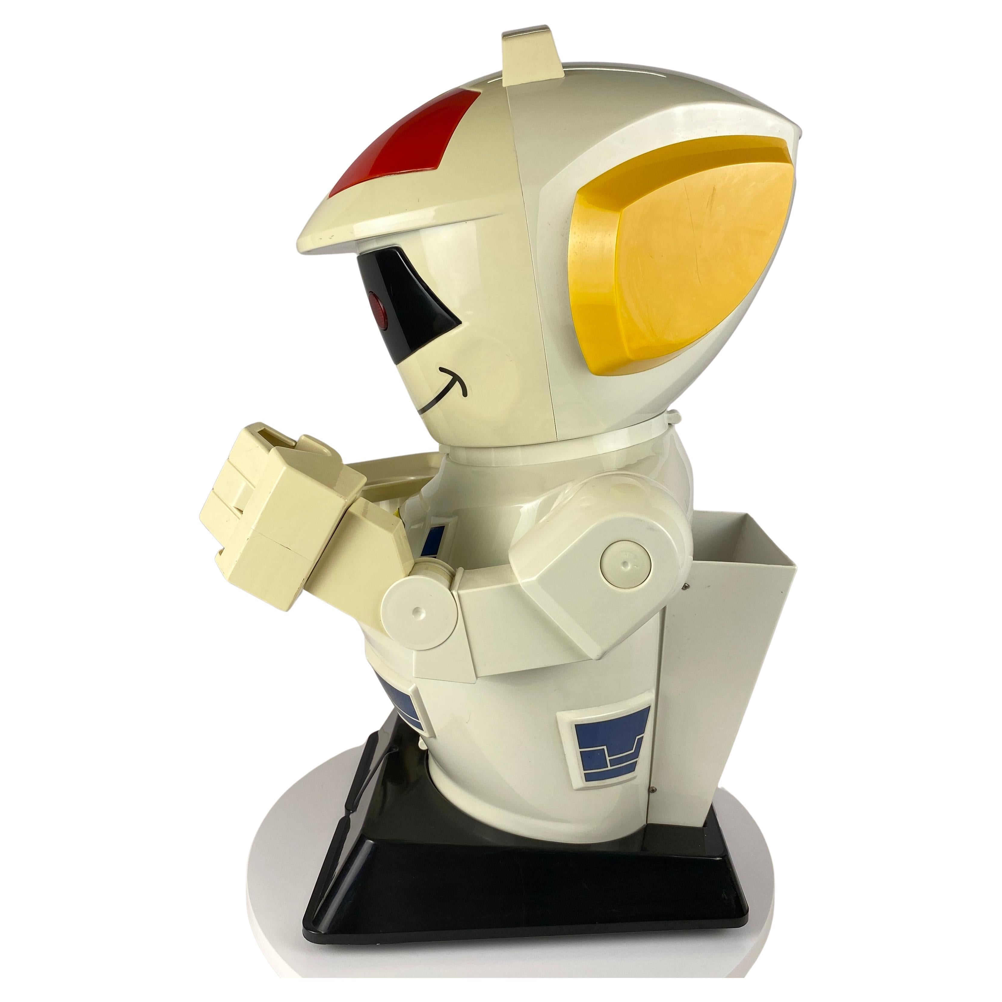 Vintage Toy Robot: A Nostalgic Delight

Bring a touch of retro charm to your home with this delightful vintage toy robot. This charming mechanical companion, named Emiglio, is in working order and ready to bring joy to your child(ren) or he can