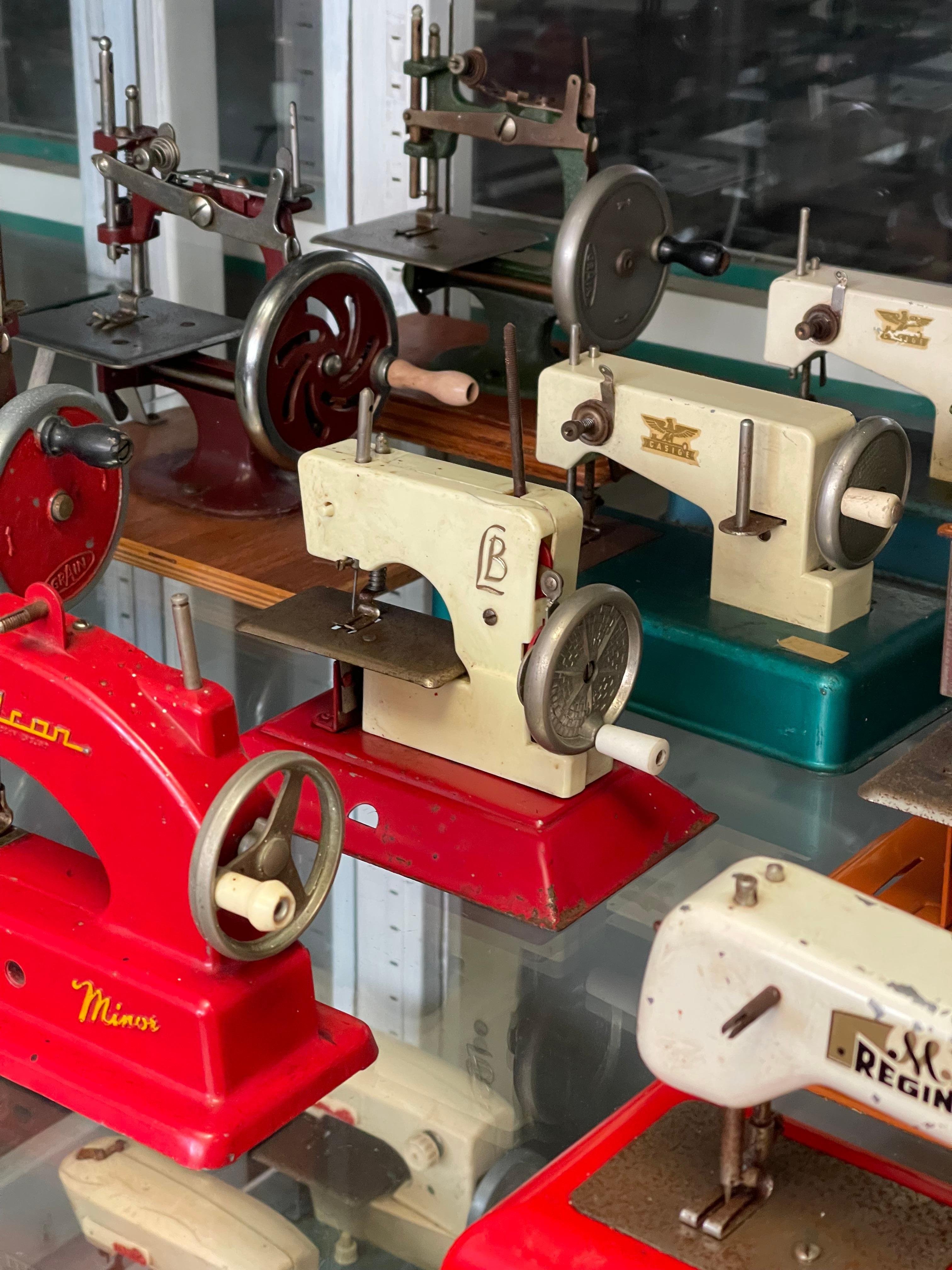 Vintage Toy Sewing Machine Collection Featuring Singer, Vulcan, Regina, Elna, an 5