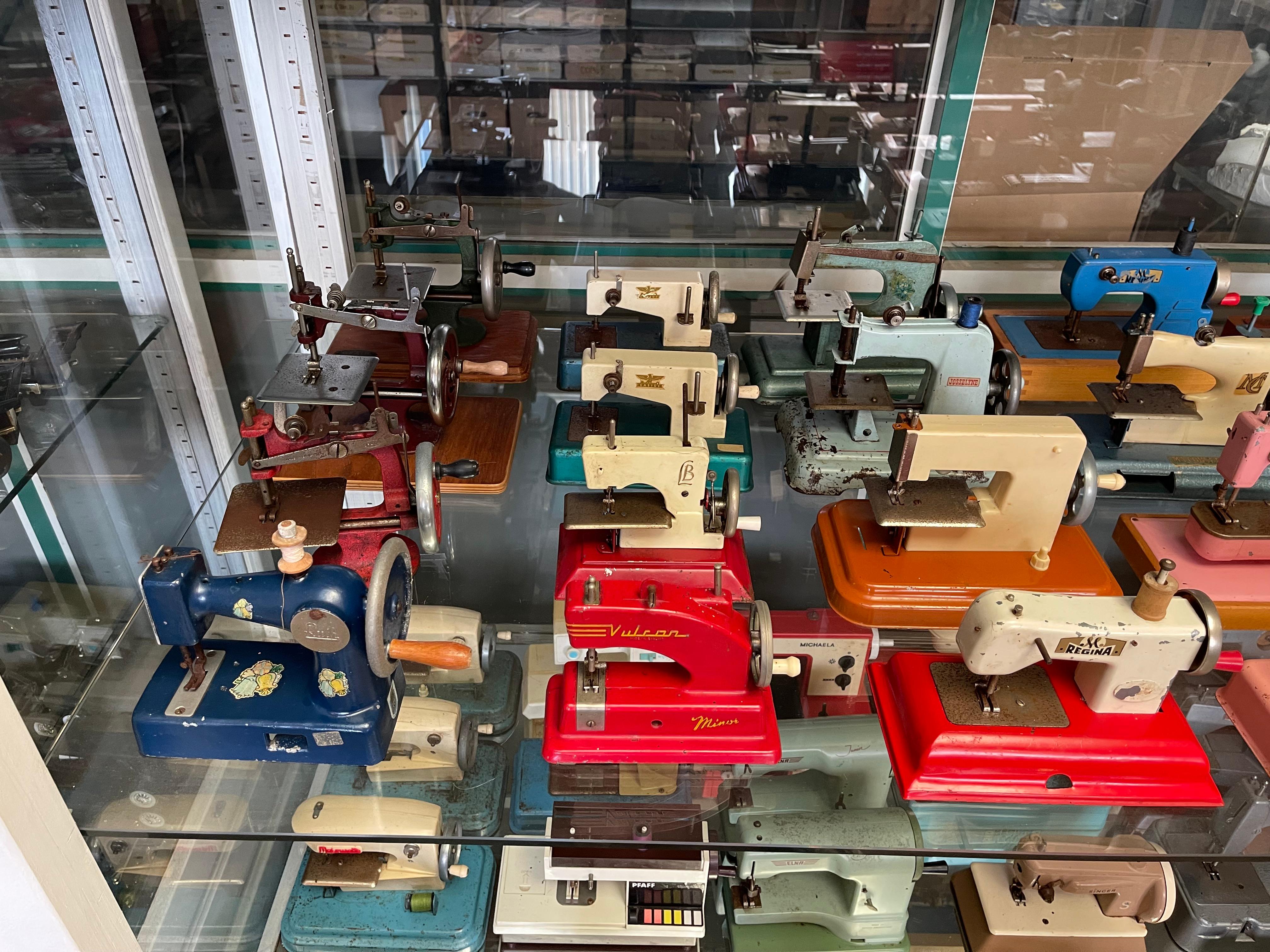 Hand-Crafted Vintage Toy Sewing Machine Collection Featuring Singer, Vulcan, Regina, Elna, an