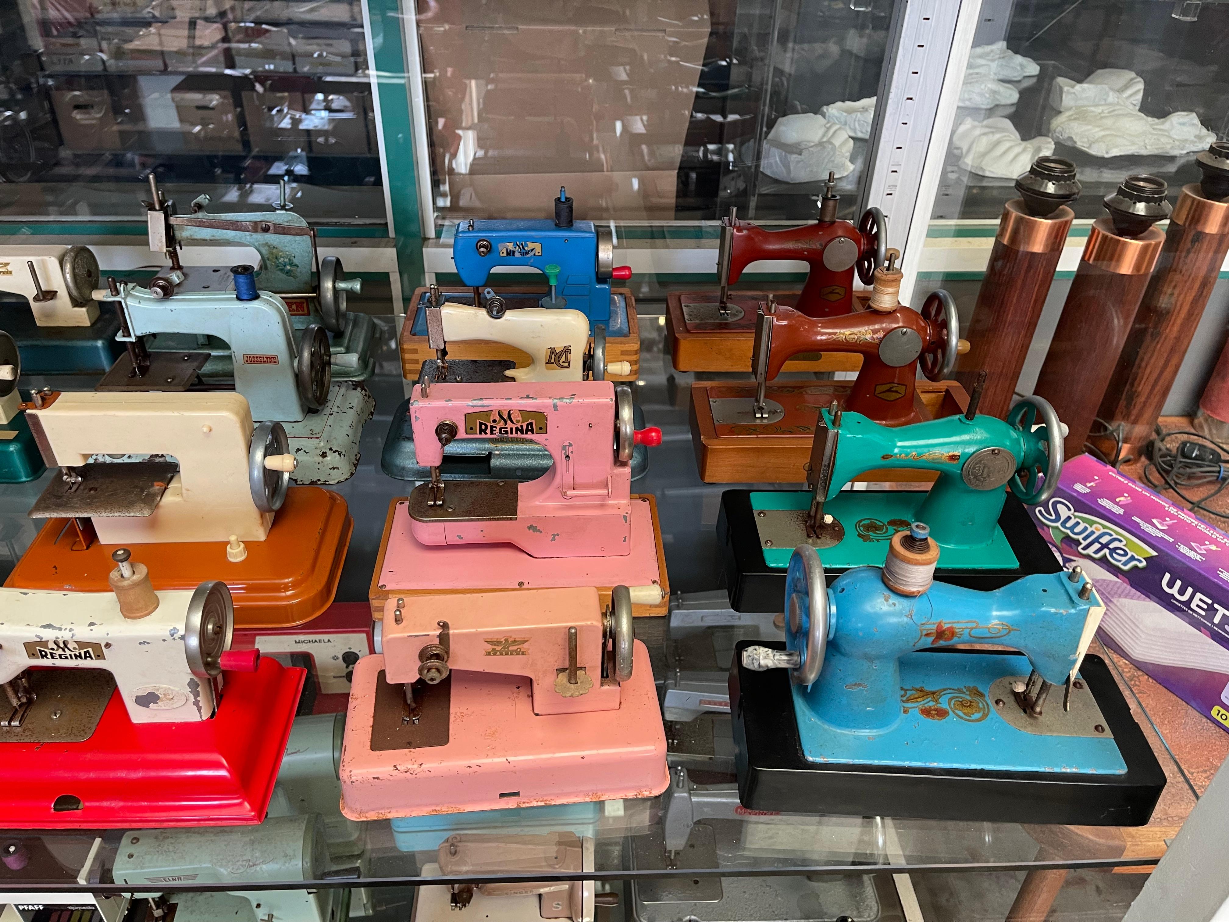 Vintage Toy Sewing Machine Collection Featuring Singer, Vulcan, Regina, Elna For Sale 1
