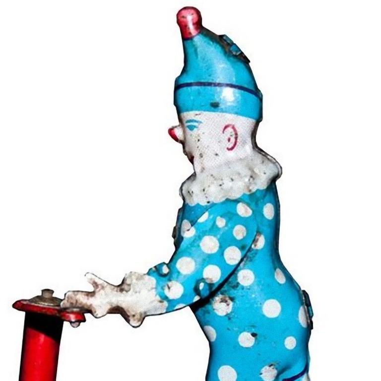 This Vintage Wind up Clown on Scooter is a vintage mechanical toy.

Made in lithographed tin in 1950s by Lemezaru Gyar circus in Budapest.

Clockwork works perfectly, original key not included.

Good conditions surfaces, one wheel is not