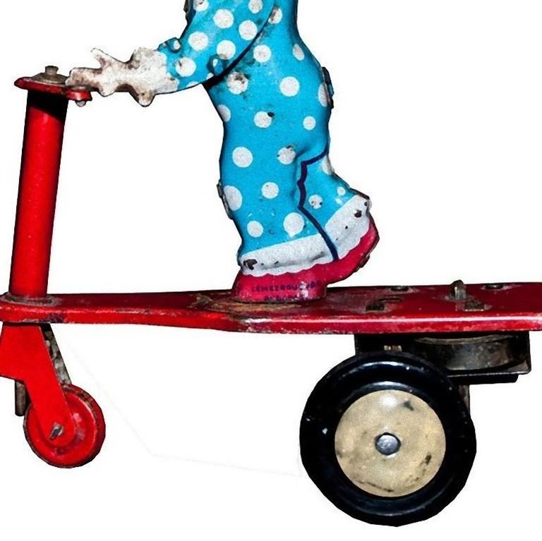 Vintage Toy, Wind Up Clown on Scooter, 1950s For Sale at 1stDibs
