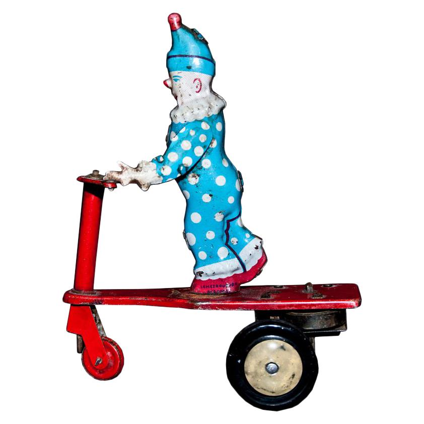 Vintage Toy, Wind Up Clown on Scooter, 1950s 