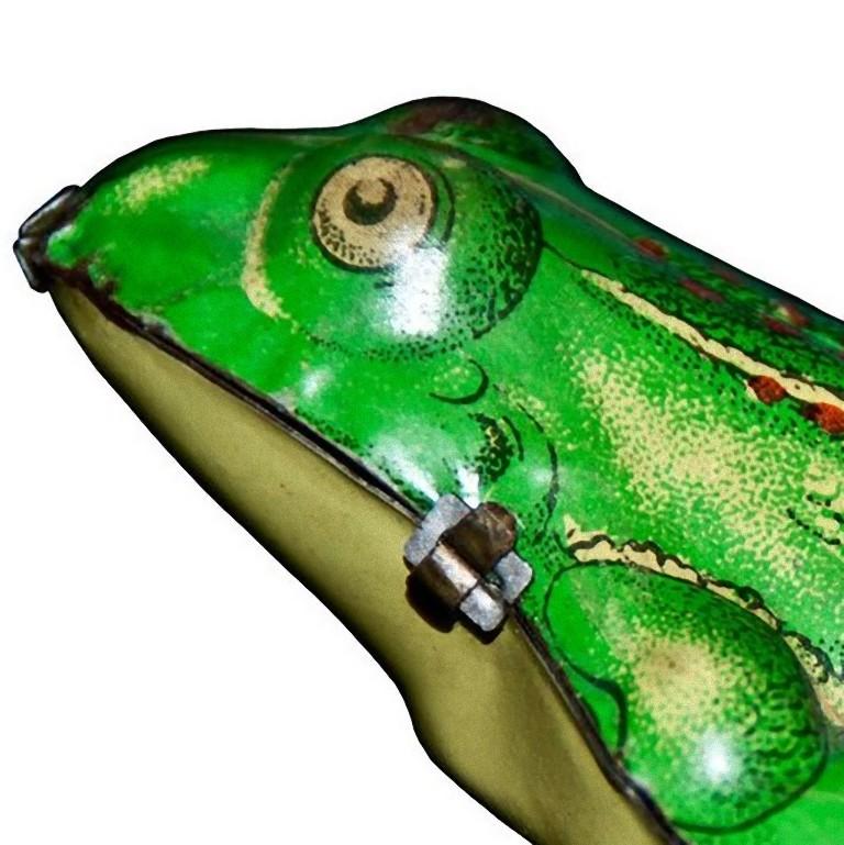 This wind up frog is an original vintage toy.

Vintage toy representing a wind up green jumping frog.
Unknown age and manufacturer.
Very good conditions.

This object is shipped from Italy. Under existing legislation, any object in Italy