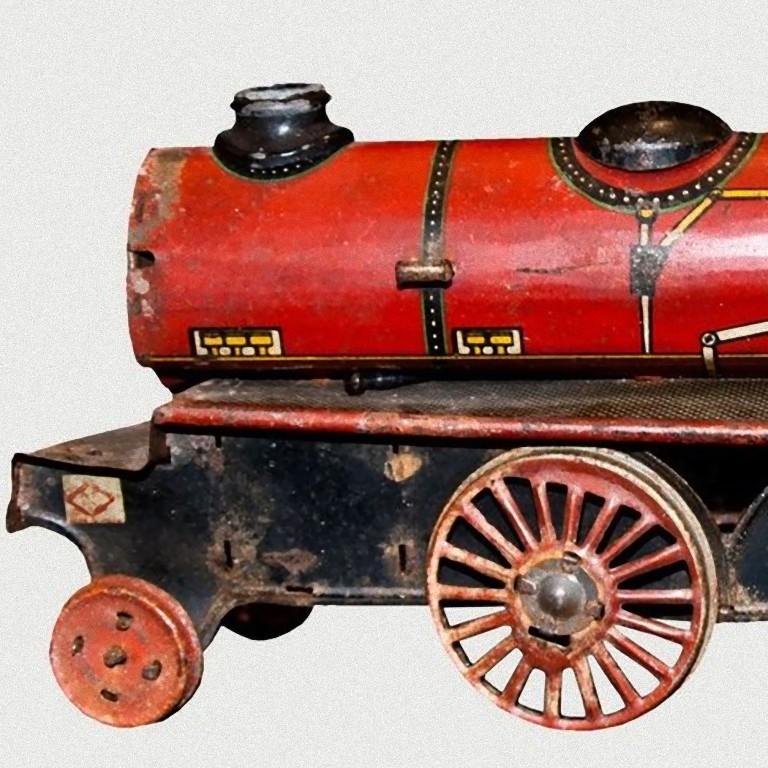 This wind up locomotive Ingap 67001 is a vintage toy representing a red mechanical locomotive.

Made in tin by Ingap, model n. 67001.
Probably made in 1920s.
3 wheels missing, mechanism does not work.
Not perfect conditions.

This object is