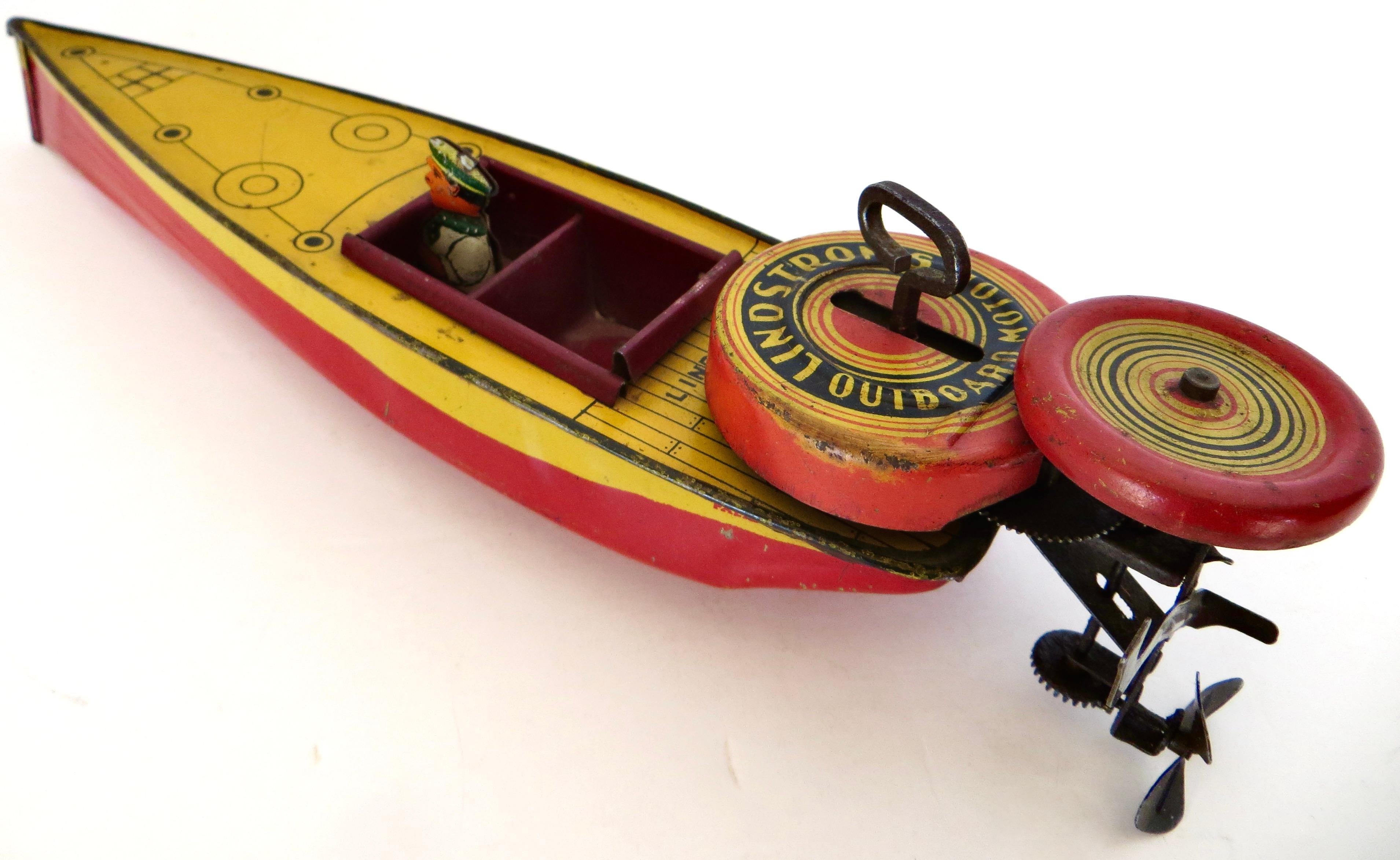 Vintage toy speed boat manufactured by the Lindstrom Toy Company of Bridgeport Connecticut, circa 1933 or earlier; the Lindstrom company having been founded in 1913, made quality tin wind-up toys until World War II when they went out of business.