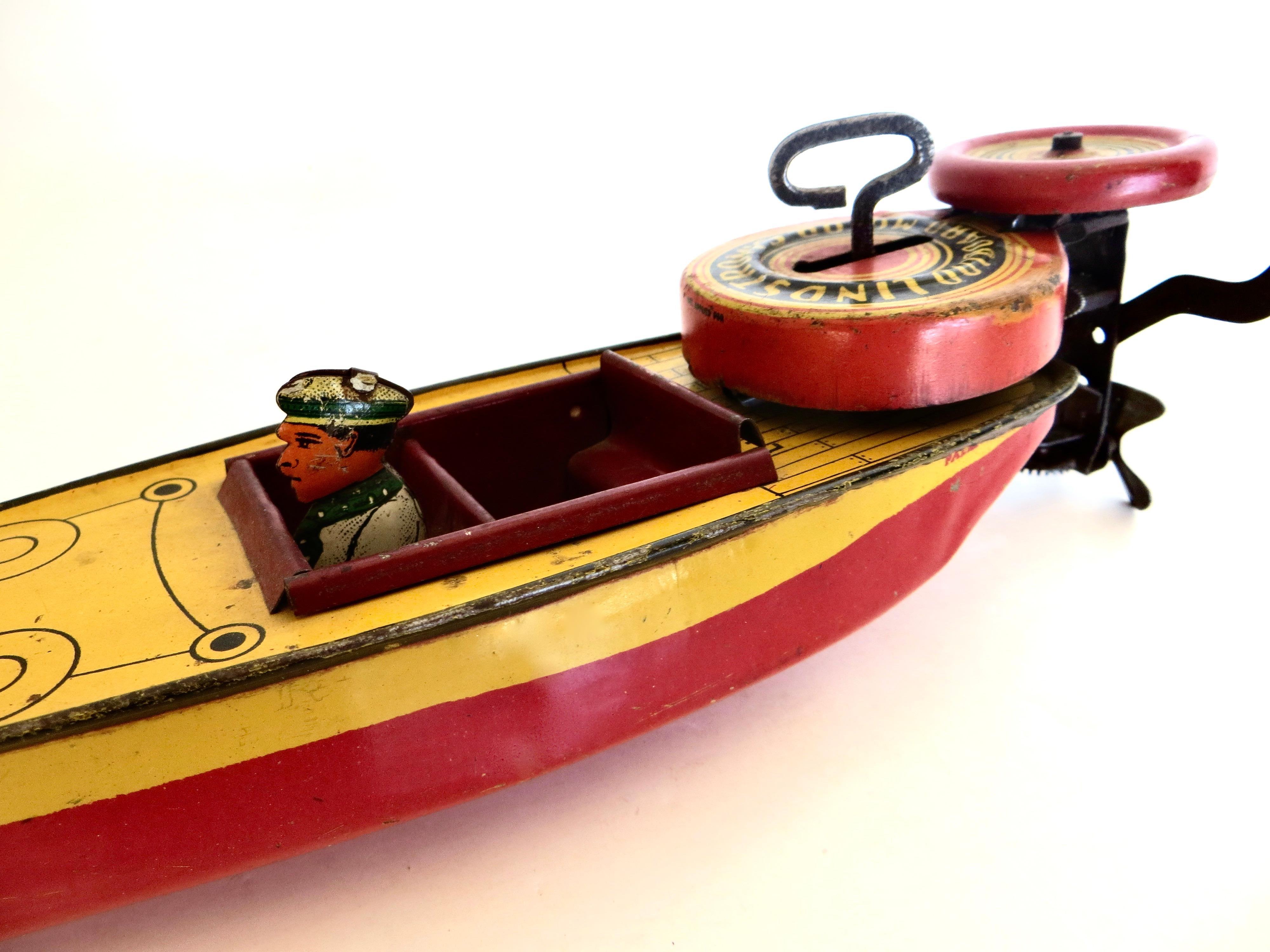 Tin Vintage Toy Wind-Up Speed Boat with Driver by Lindstrom Toy Co., American 1933 For Sale