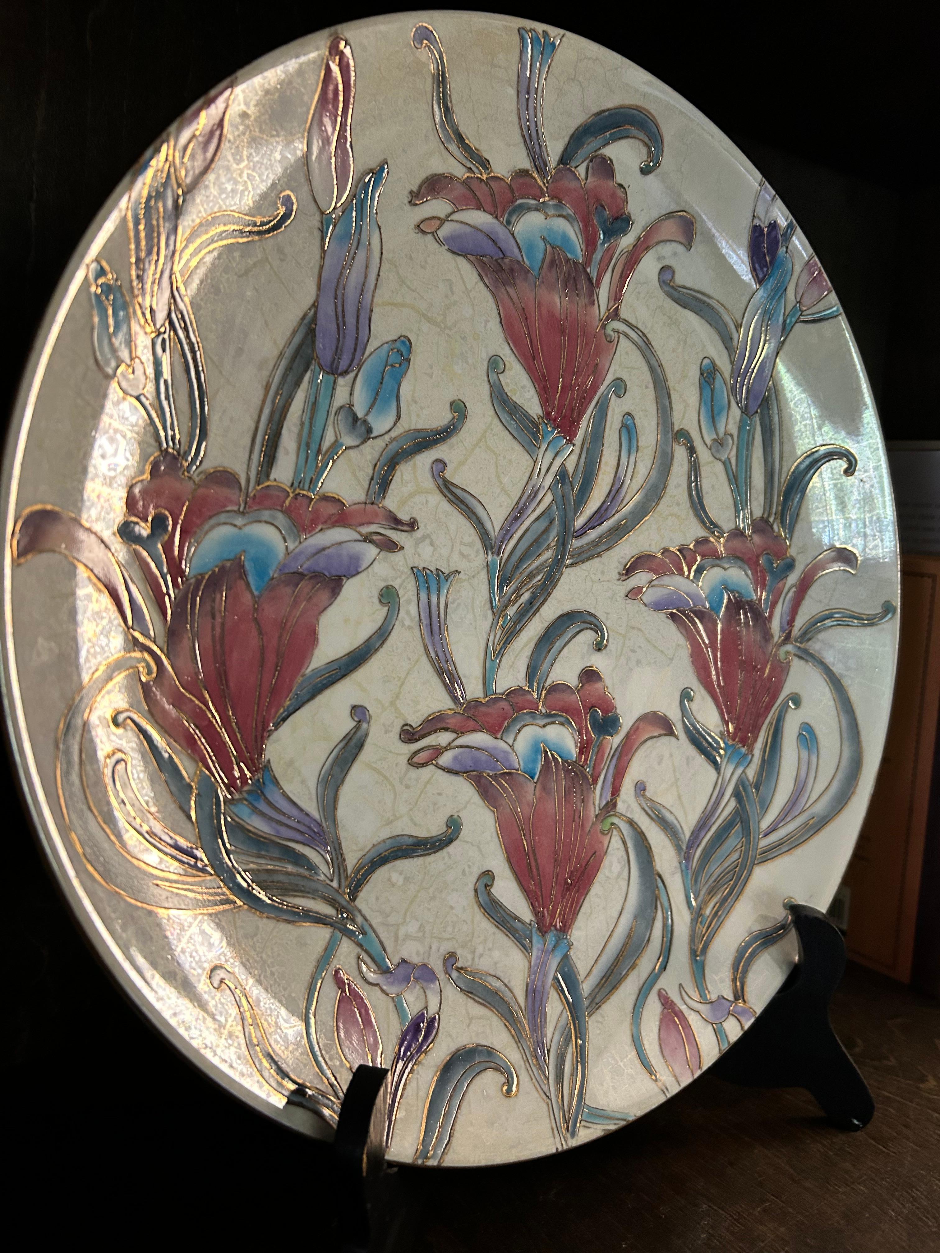 Beautiful Vintage Toyo Hand Painted Floral procelain Decorative Large Plate. It does come with a stand. This piece is only for decorative purposes. It has been kept in really good condition, there are no breaks or chips. See pictures. Add this to