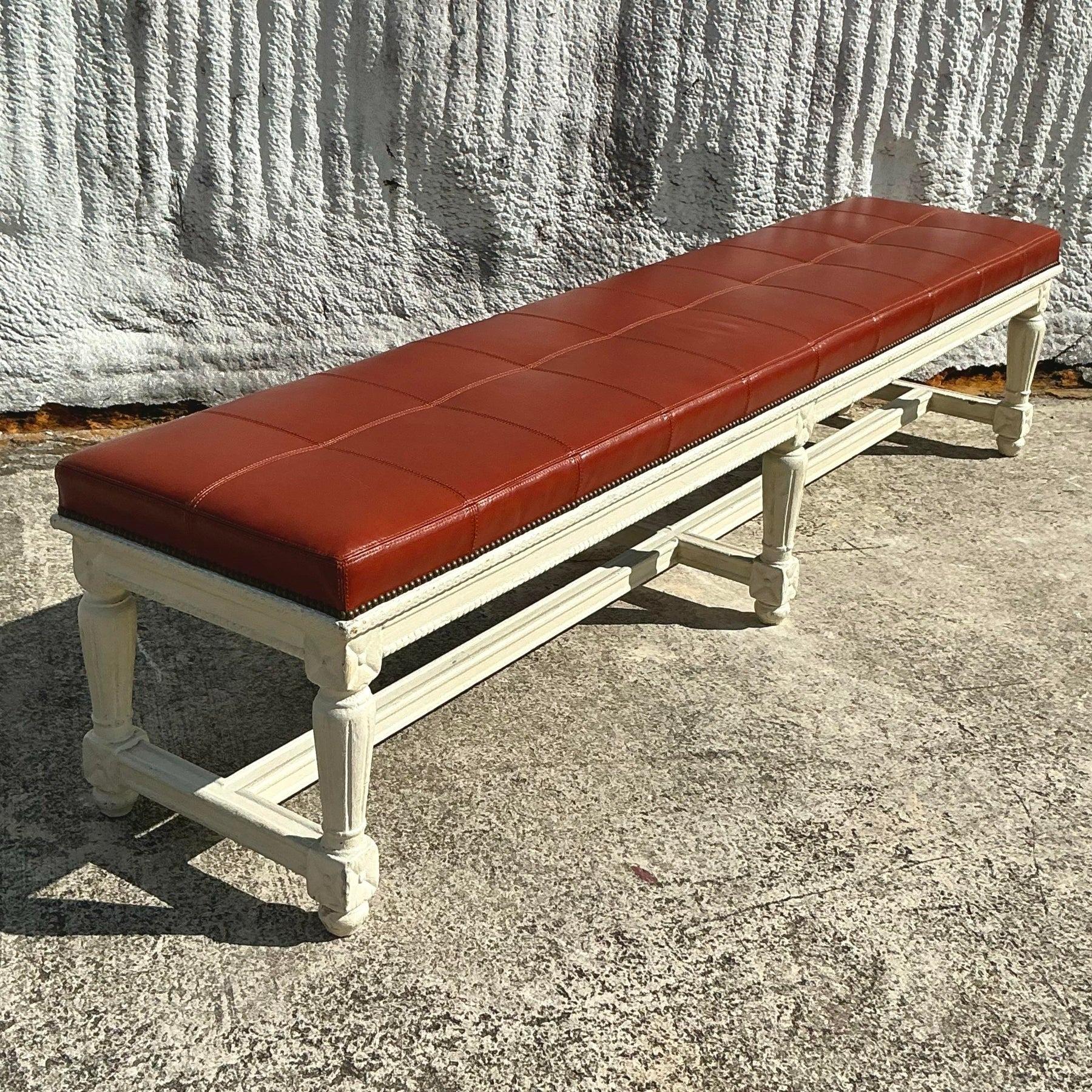 Add a touch of timeless elegance to your space with this vintage 19th-century leather bench. Featuring a rich patina and traditional craftsmanship, this piece exudes old-world charm and sophistication. The supple leather upholstery is complemented