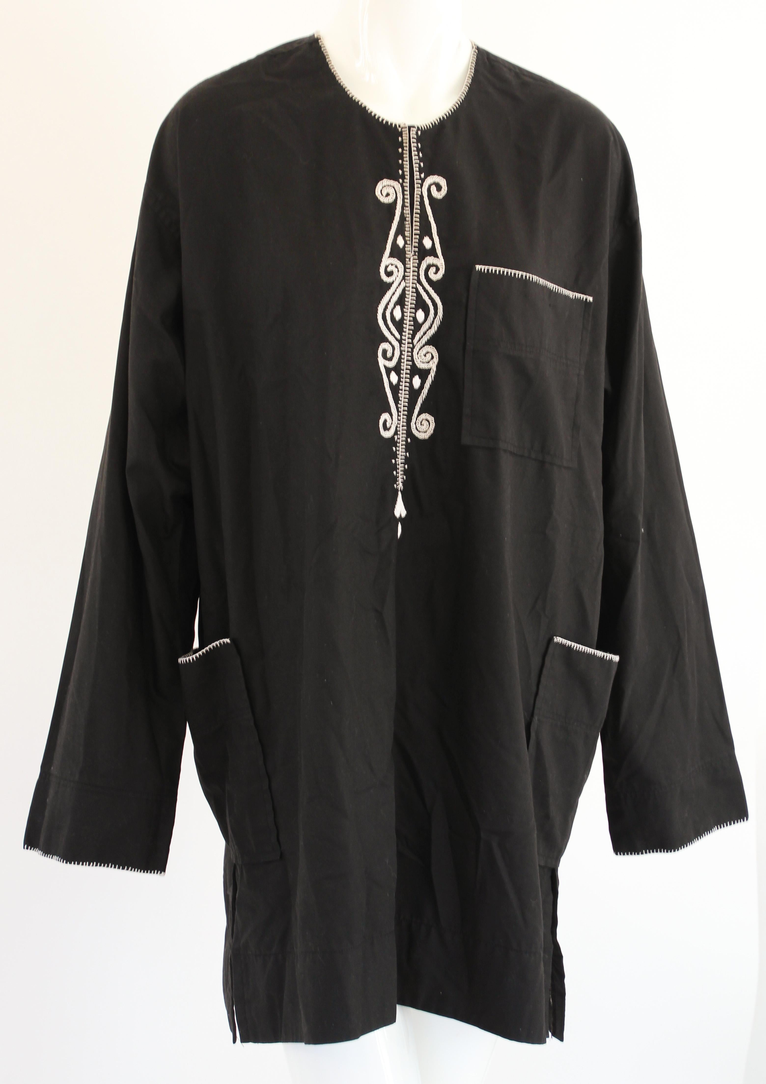 Vintage Traditional African Embroidery Black Shirt.
Black cotton shirt embroidered with white threads.
2 front pockets.
size large to xl.
Dimesions flat.
Across shoulders: 20
