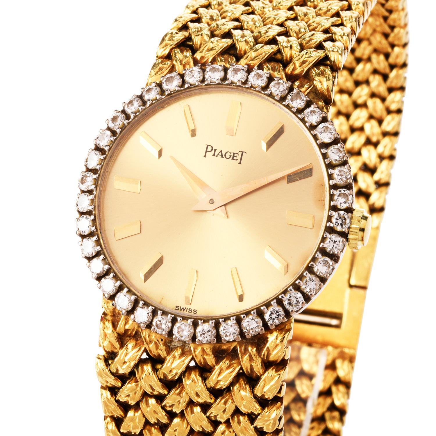 Very good  Conditioned Ladies late 1970's Traditional Piaget watch.

A factory set diamond bezel encompasses the gold dial and markers approx. 1.20 carats F-G color VS1 Clarity.

The casing and bracelet are 1 and are in the pattern of crisscross