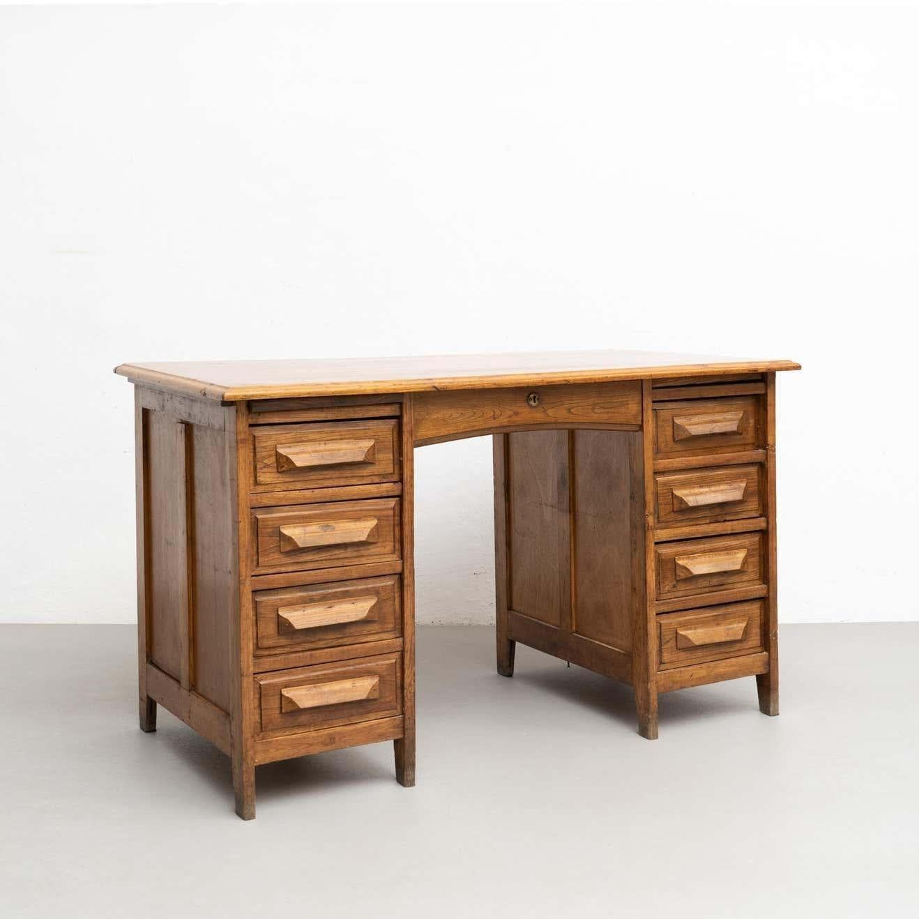 Vintage traditional Spanish American writing desk.    By unknown manufacturer from Spain, circa 1940.    In original condition, with minor wear consistent with age and use, preserving a beautiful patina.    Material:  Wood.    