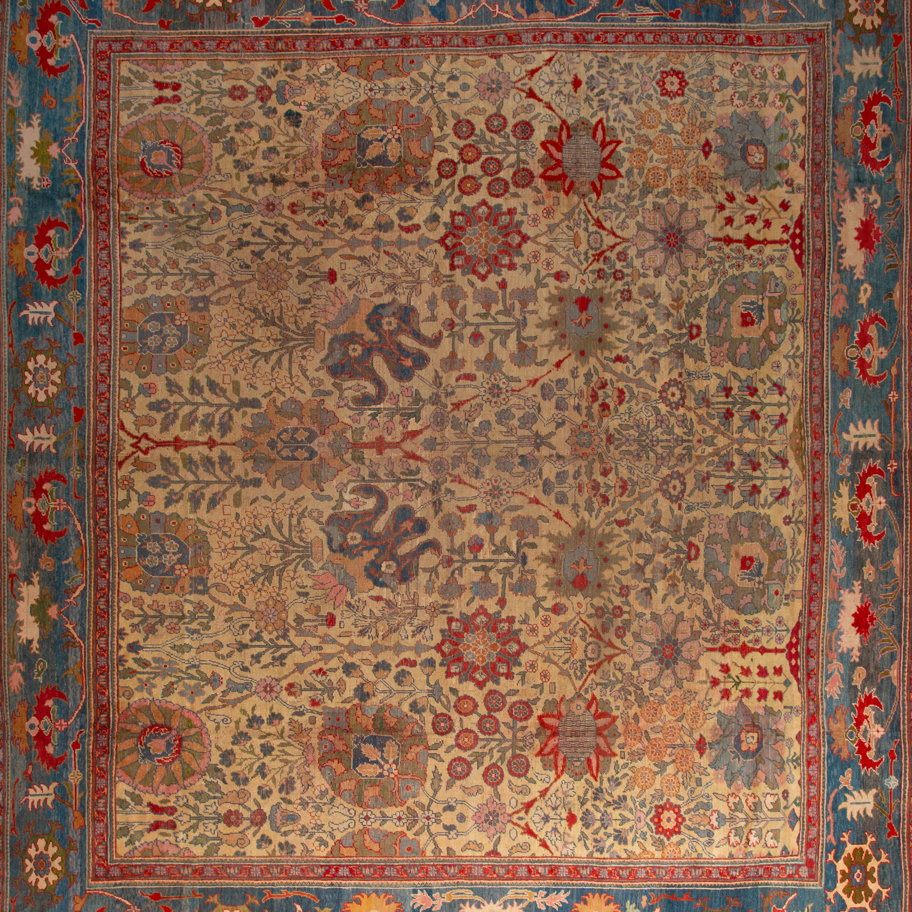 Hand-knotted in Turkey, this Oushak Wool Rug - 16'5