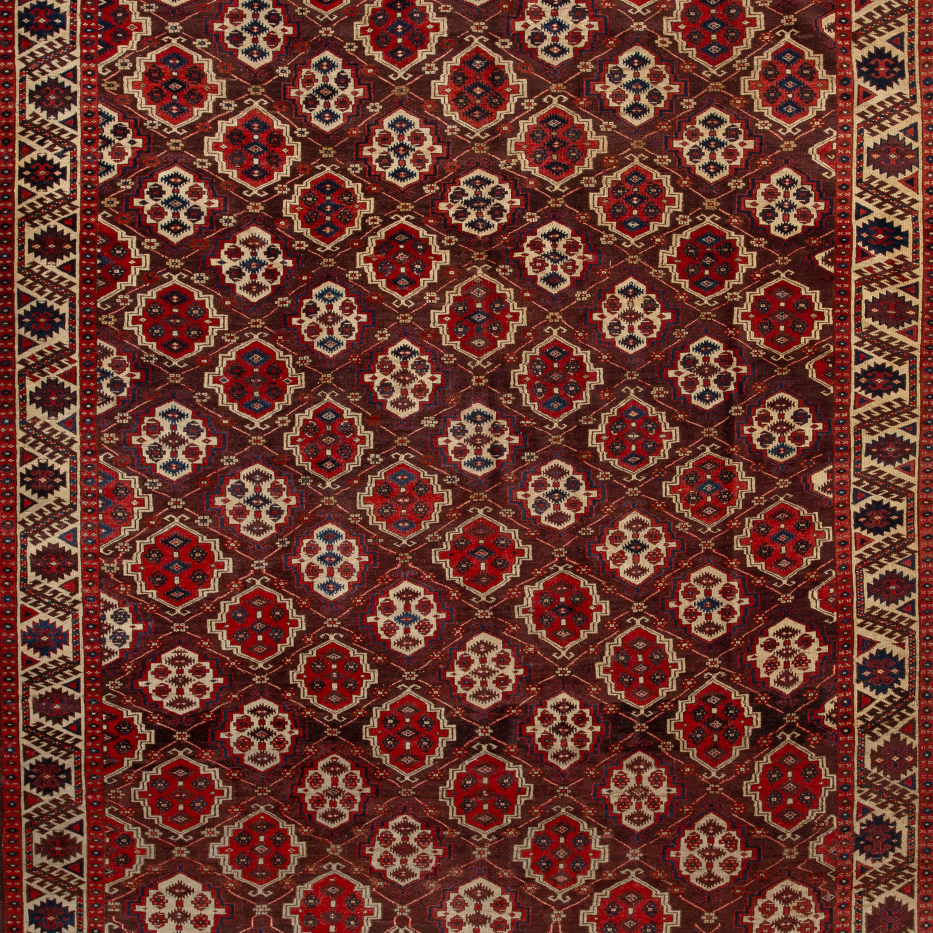 Featuring an intricate pattern in a classic red color palette, this hand-knotted Vintage Wool Rug - 7'2