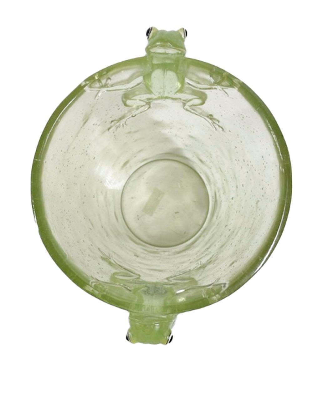 Mid-Century Modern translucent and bubbly green Lucite ice bucket / wine cooler of tapered form with tree frog handles climbing above the rim.