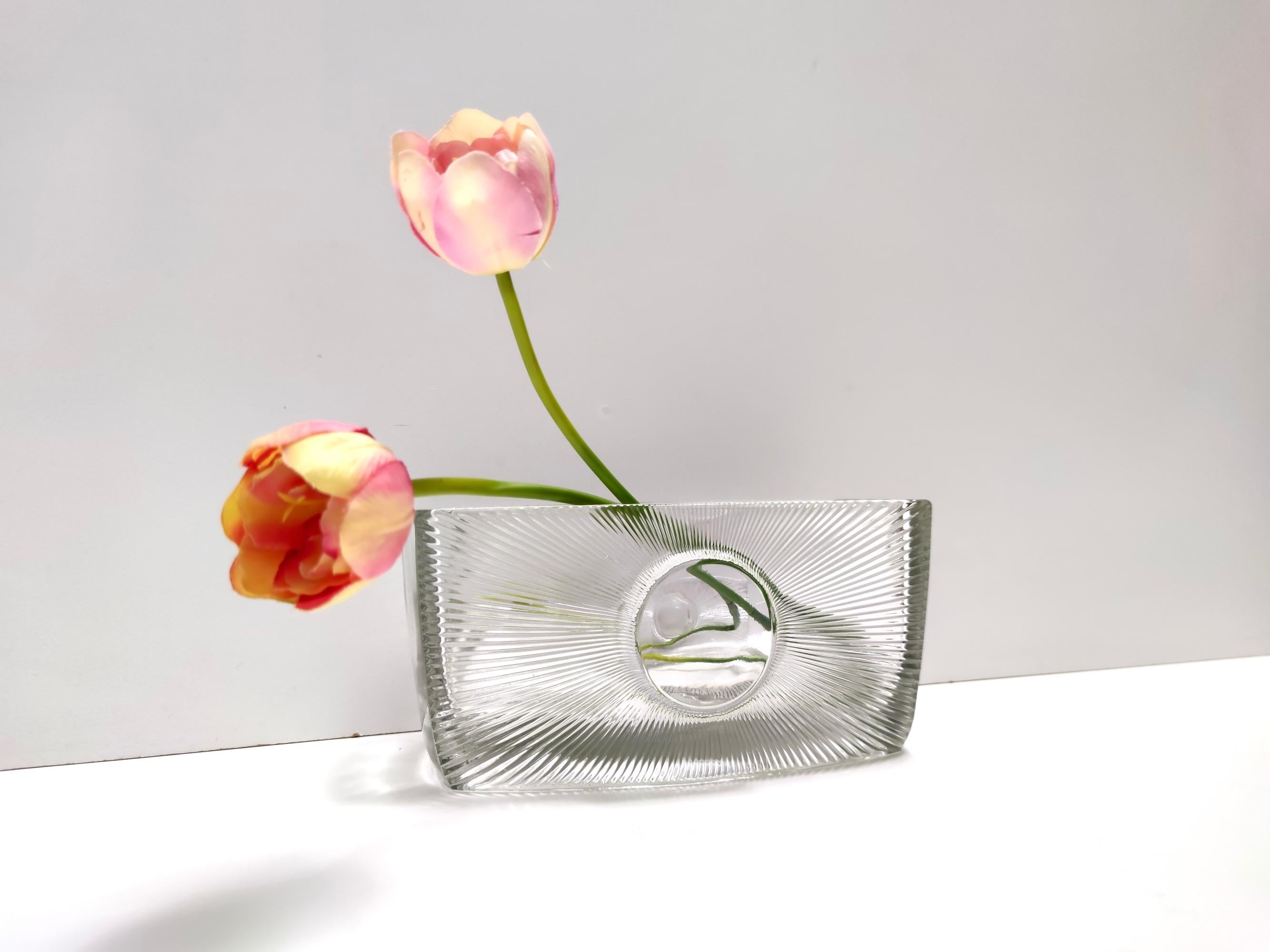 Made in Czech Republich.
In 1969 Rudolf Jurnikl designed this pressed glass piece for Sklárna Libochovice.
His design has dynamic forms and lively curves. In 70s Jurnikl used a floral design.
Iconic for his work is this vase, called SUN and later