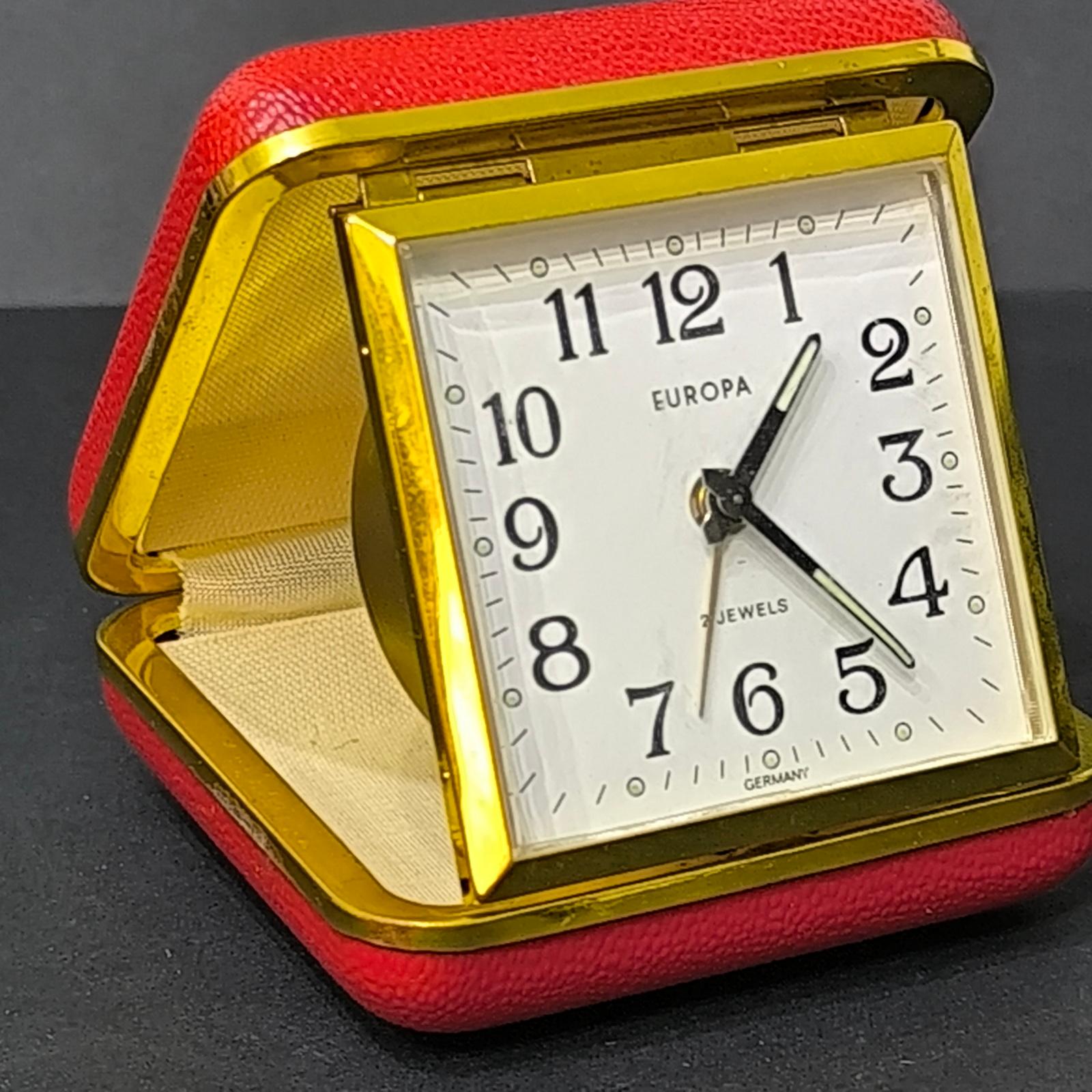 Metal Vintage Travel Alarm Clock Europa, Germany, 2 Jewels, Brass & Faux Leather Cover For Sale
