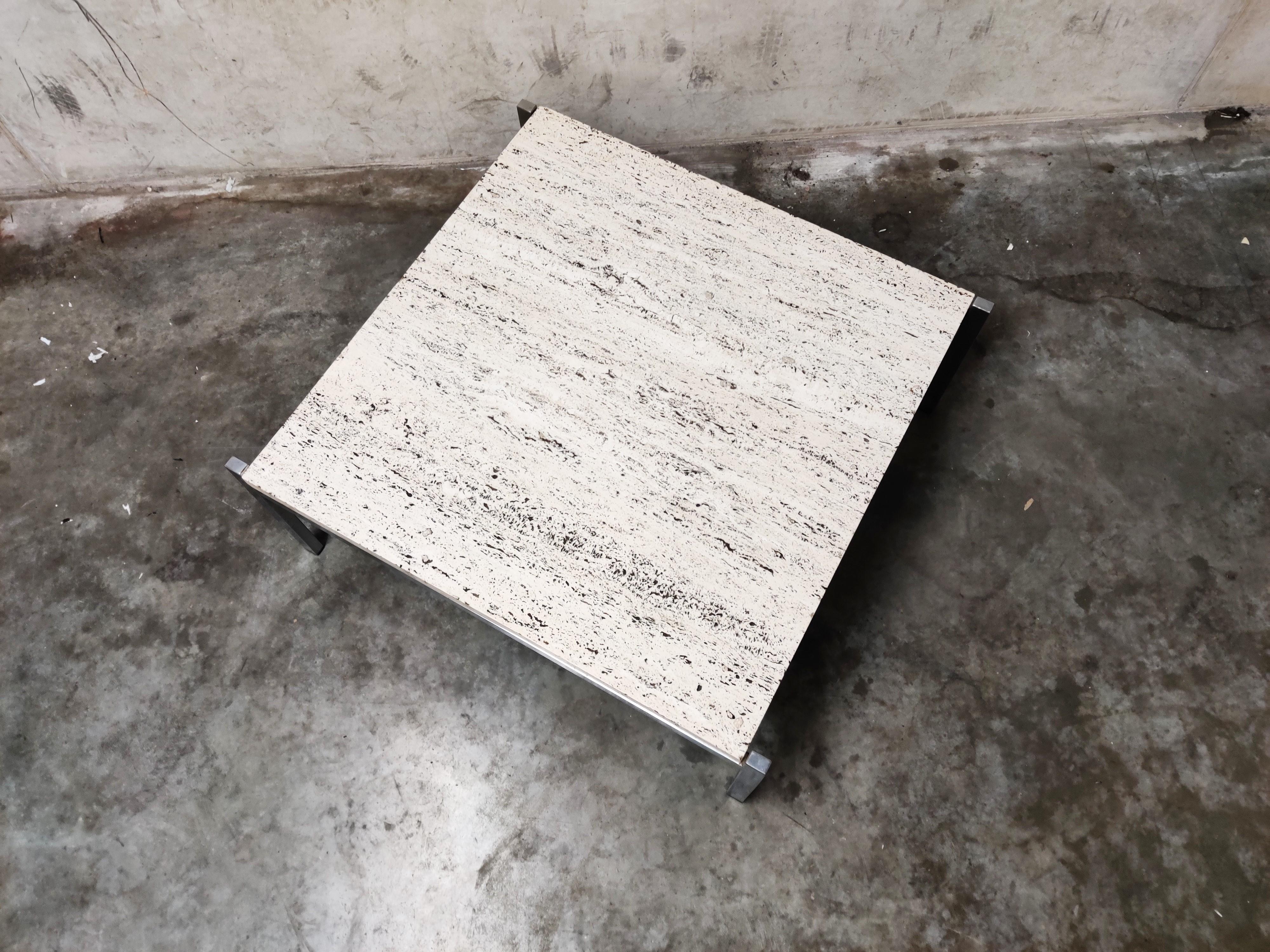 Timeless travertine coffee table with a metal base.

Beautiful travertine stone.

Very good condition.

1970s, Italy

Measures: Height 35cm/13.77