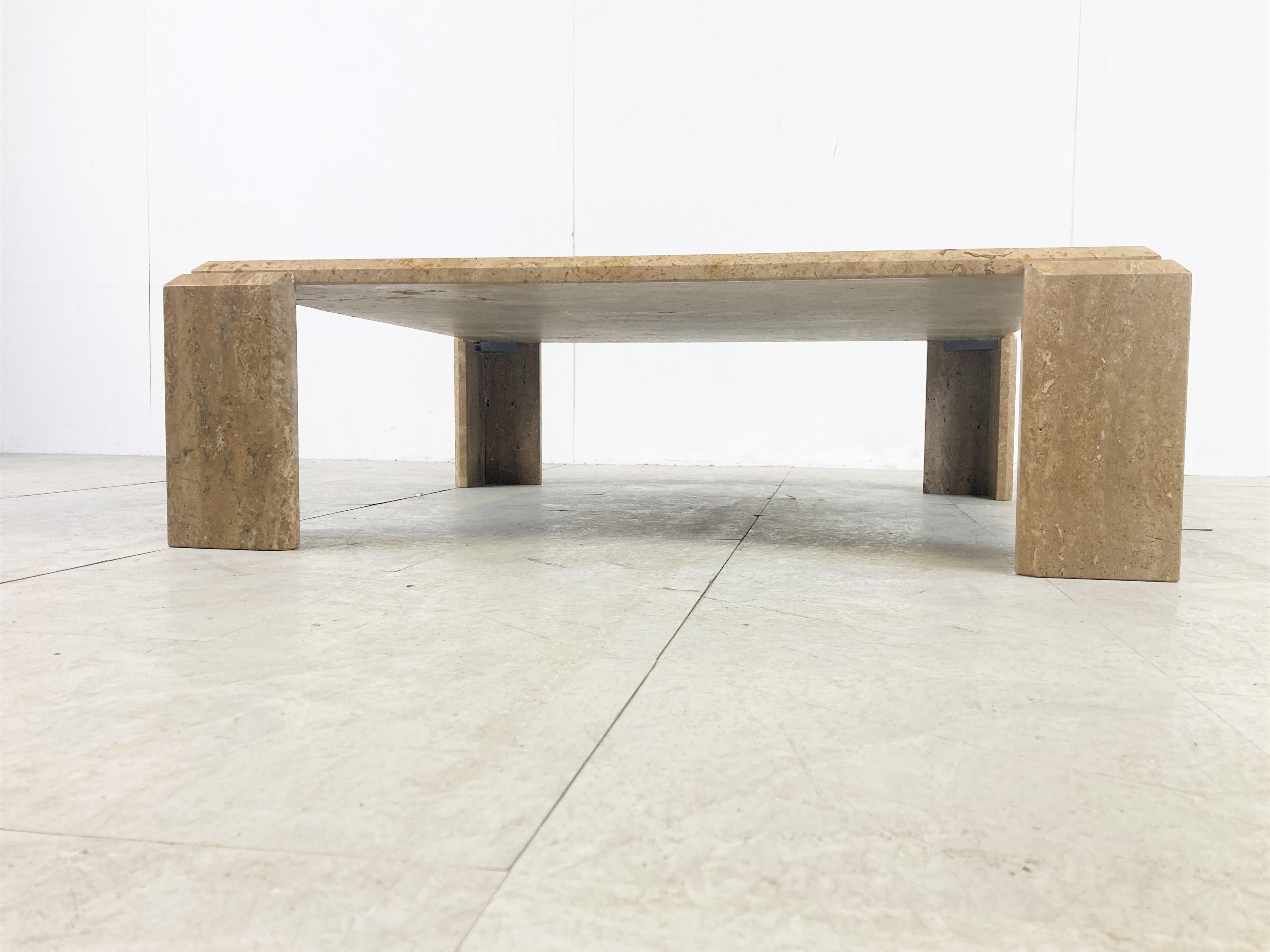Vintage square travertine coffee table with four fixed legs.

Beautiful natural travertine stone with a beveled edge.

Good condition

1970s - Italy

Measures: Height: 32cm/12.59