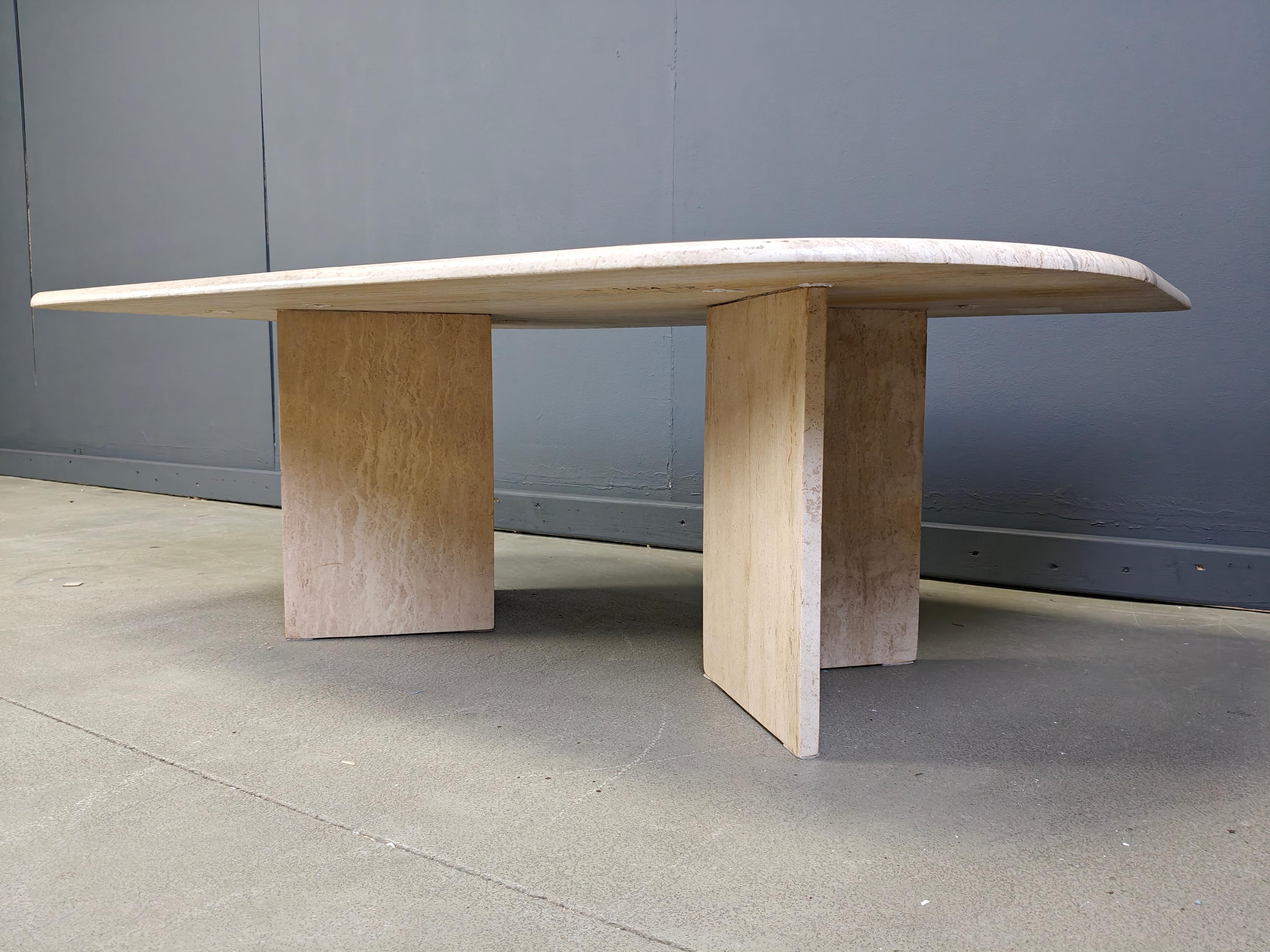 Gorgeous travertine 'eye' shaped coffee table by Roche Bobois.

These tables have been popular thanks to their curved and timeless design.

Good condition

1970s - France

Height: 44cm
Width: 120cm
Depth: 70cm

Ref.: 25081205

*All images are always