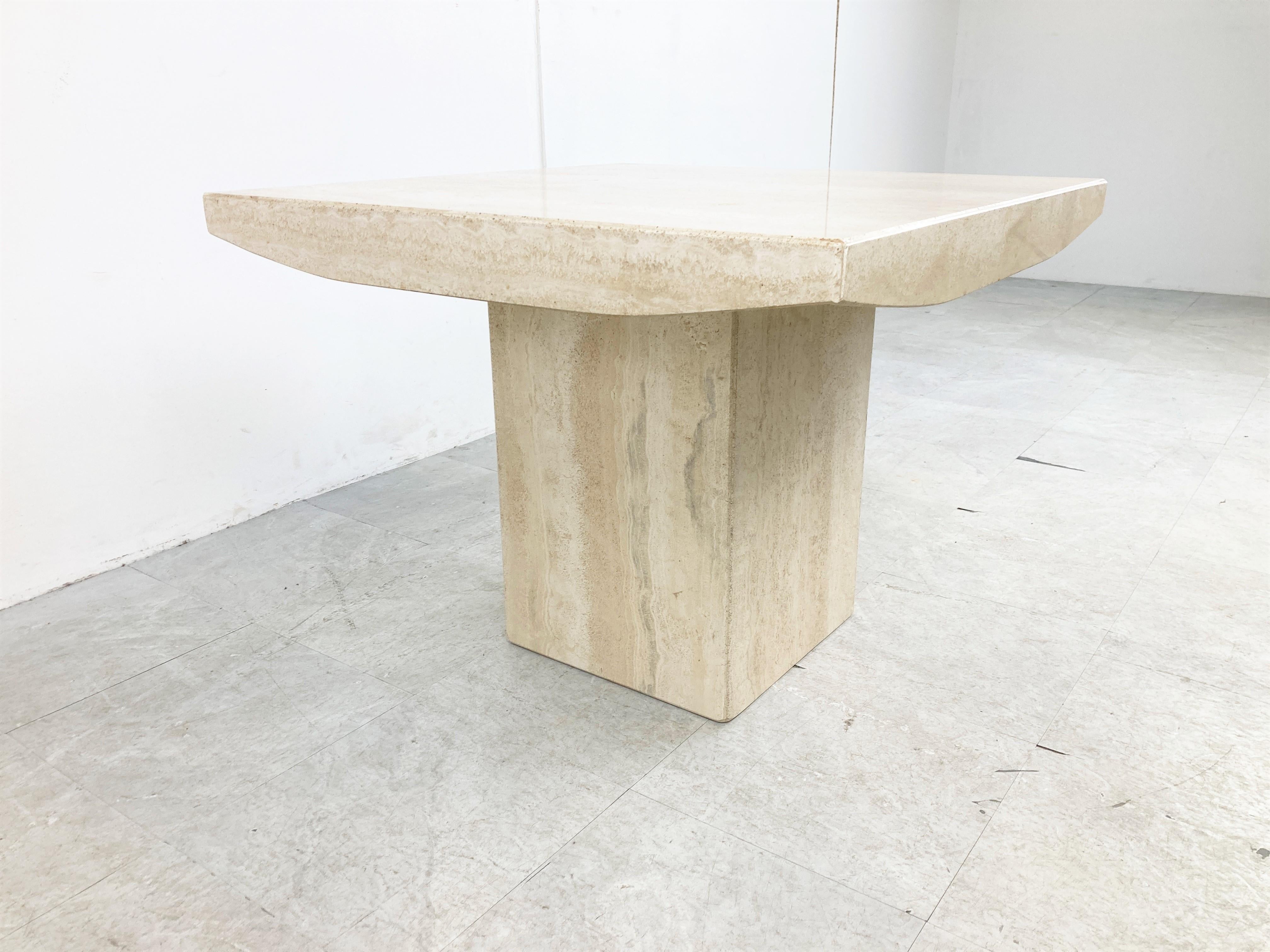 Vintage travertine coffee table or side table from the 1970s.

Nicely shaped table top

Very useful to put next to your sofa because of its height.

The table is in good condition

Timeless piece that fits almost any living room.

1970s -