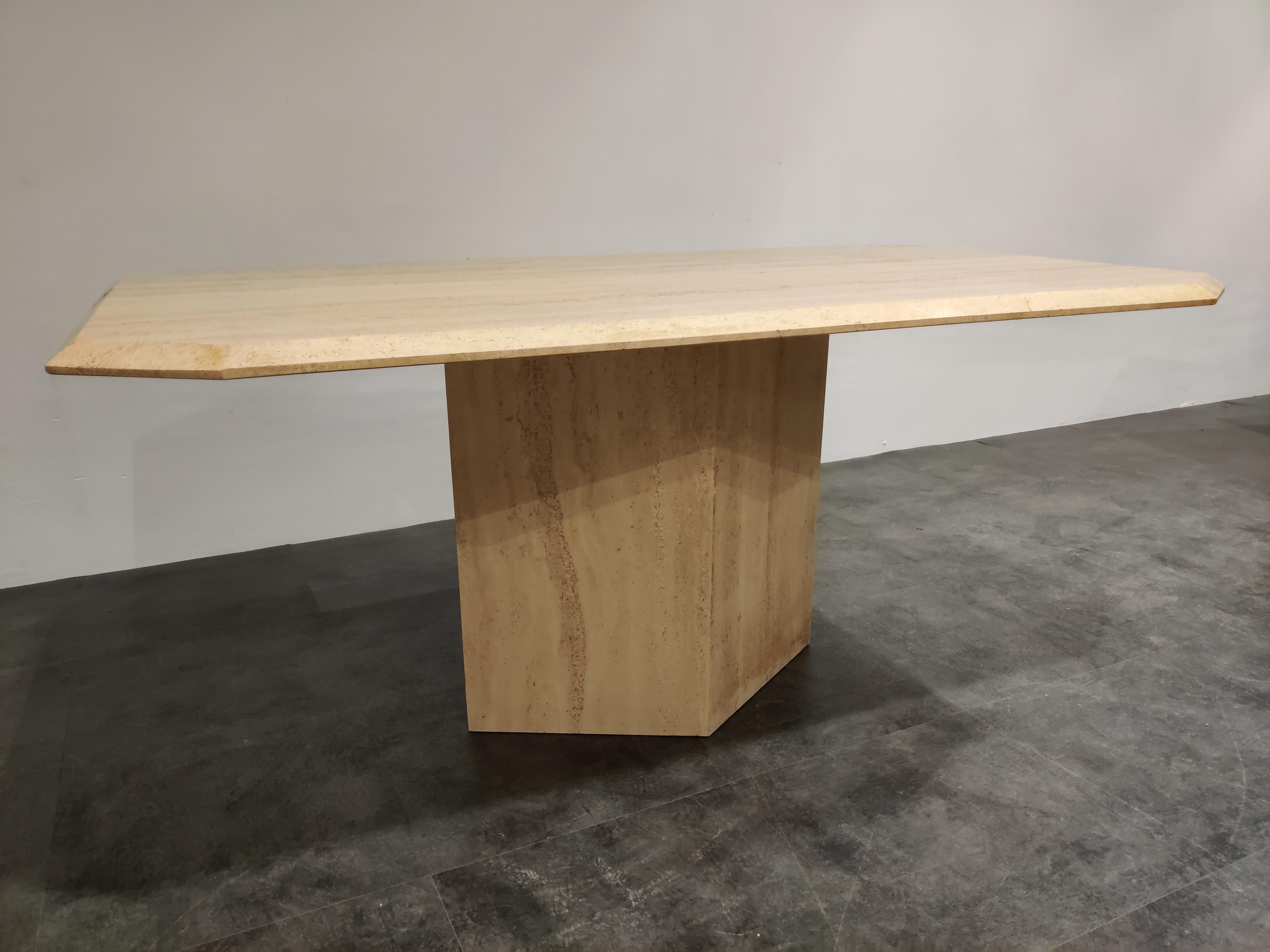 Exquisite travertine dining table with a nicely finished bevel edge table top.

Beautiful colored travertine with lovely pattern.

Timeless and very beautiful table wich fits most interios due to it's 'neutral' color.

Good condition.