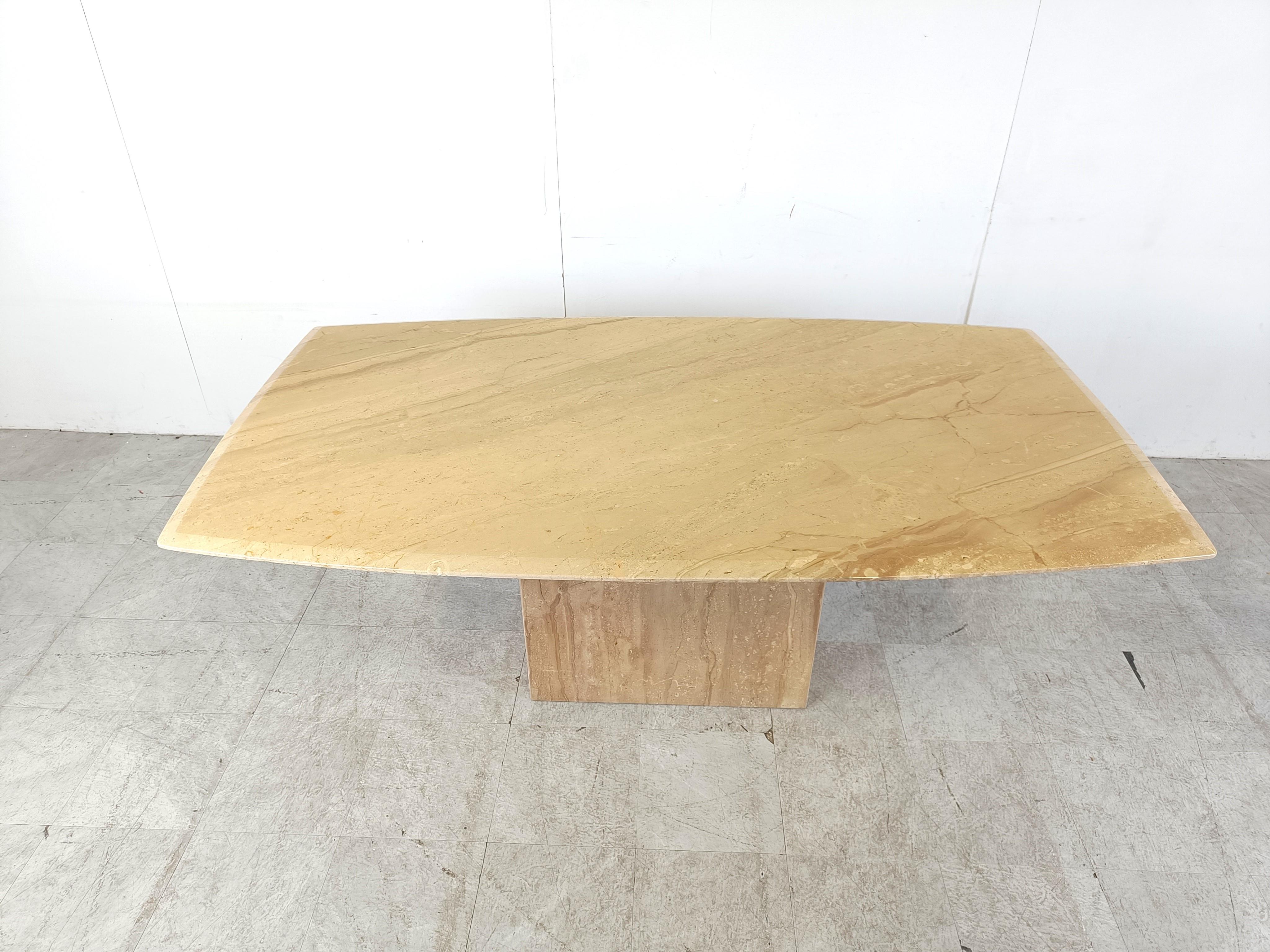 Elegant travertine dining table with a beautiful naturally veined table top with a beveled edge.

Timeless piece.

Sits up to 8 people.

1970s - Italy

Dimensions:
Height: 72cm/28.34