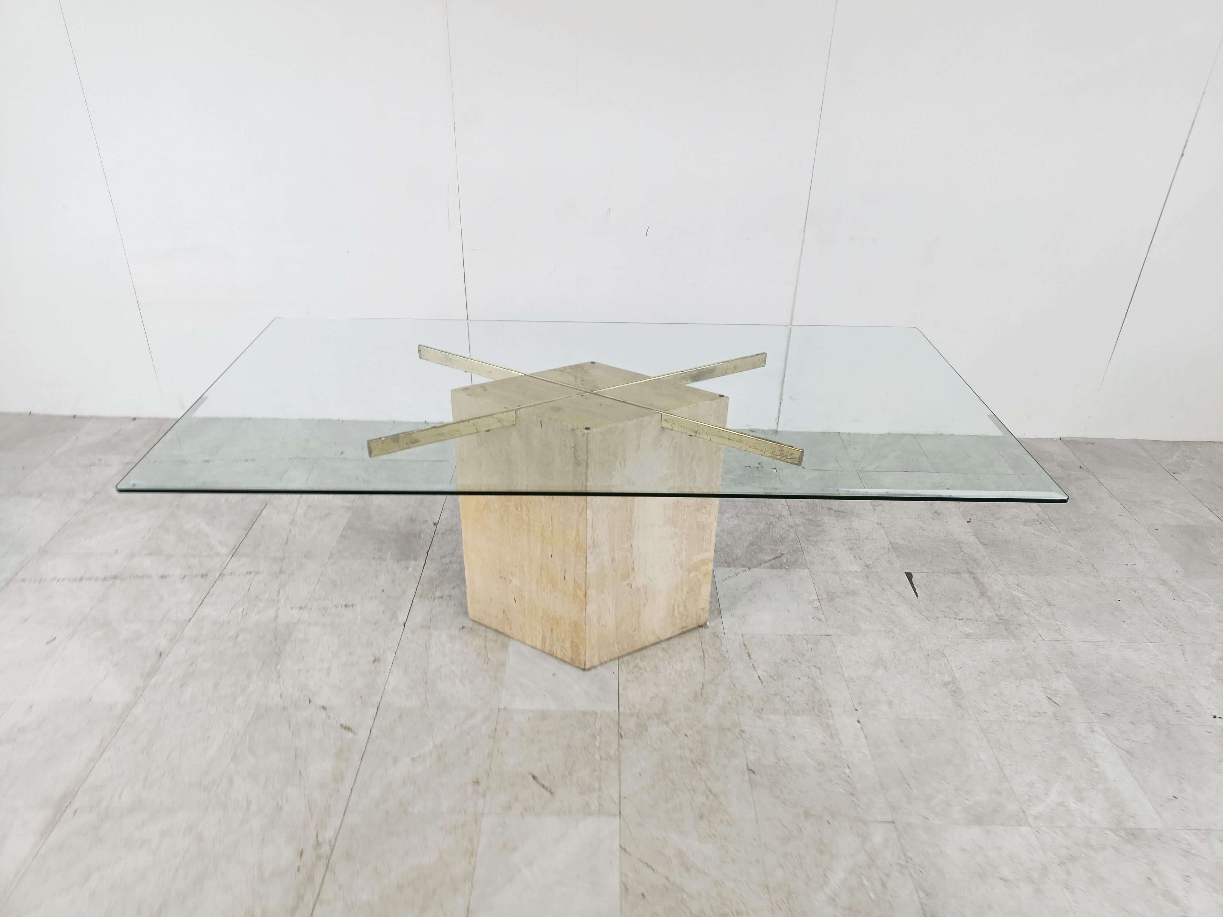 Beautiful travertine and brass dining table with a beveled glass top.

The table was made by Artedi.

Good overall condition

Charming, timeless piece.

1970s - Italy

Height: 74cm/29.13