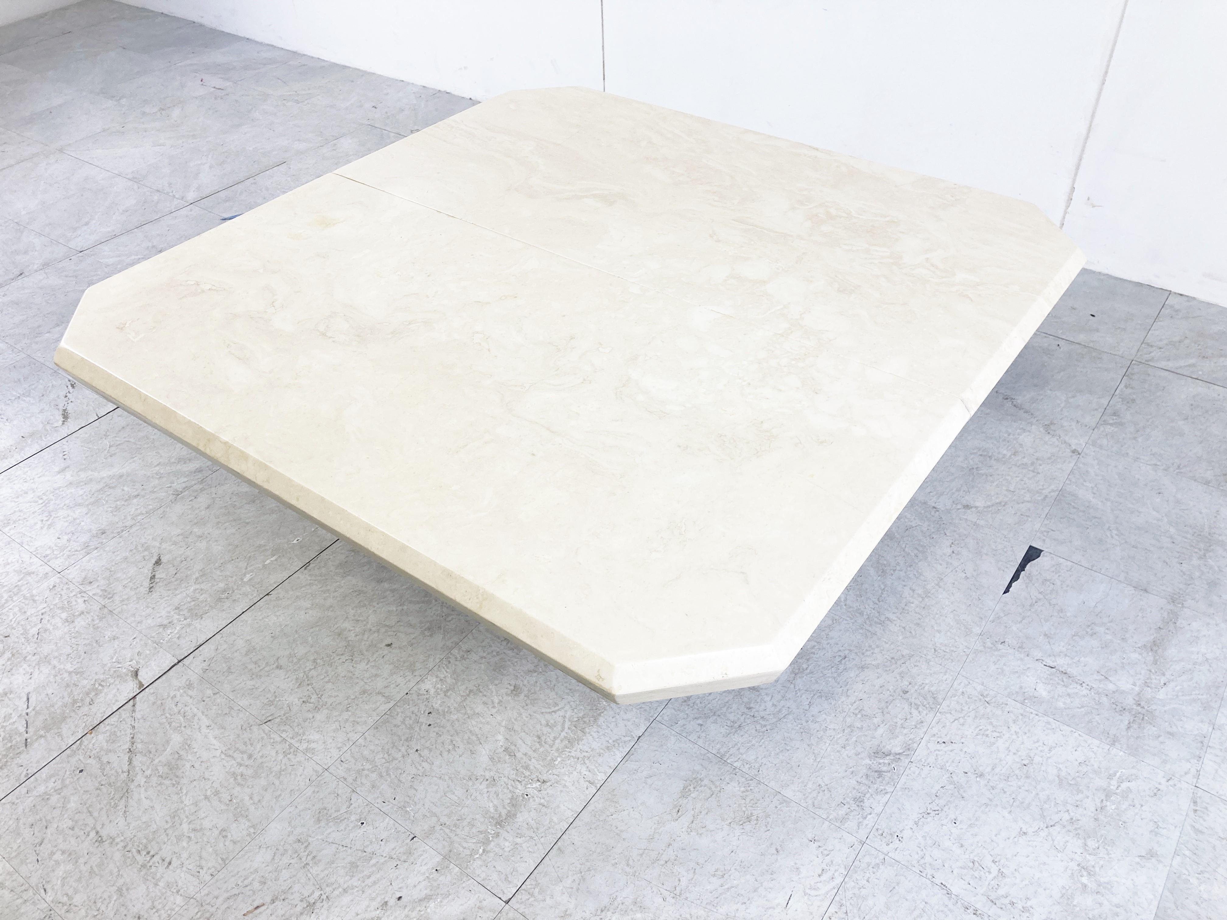 Vintage travertine hidden bar coffee table.

The two table tops slide open to reveal a storage space.

Elegant shaped base and top.

Beautiful natural coloured travertine.

Good condition.

1970s - Italy

Dimensions:
Height: