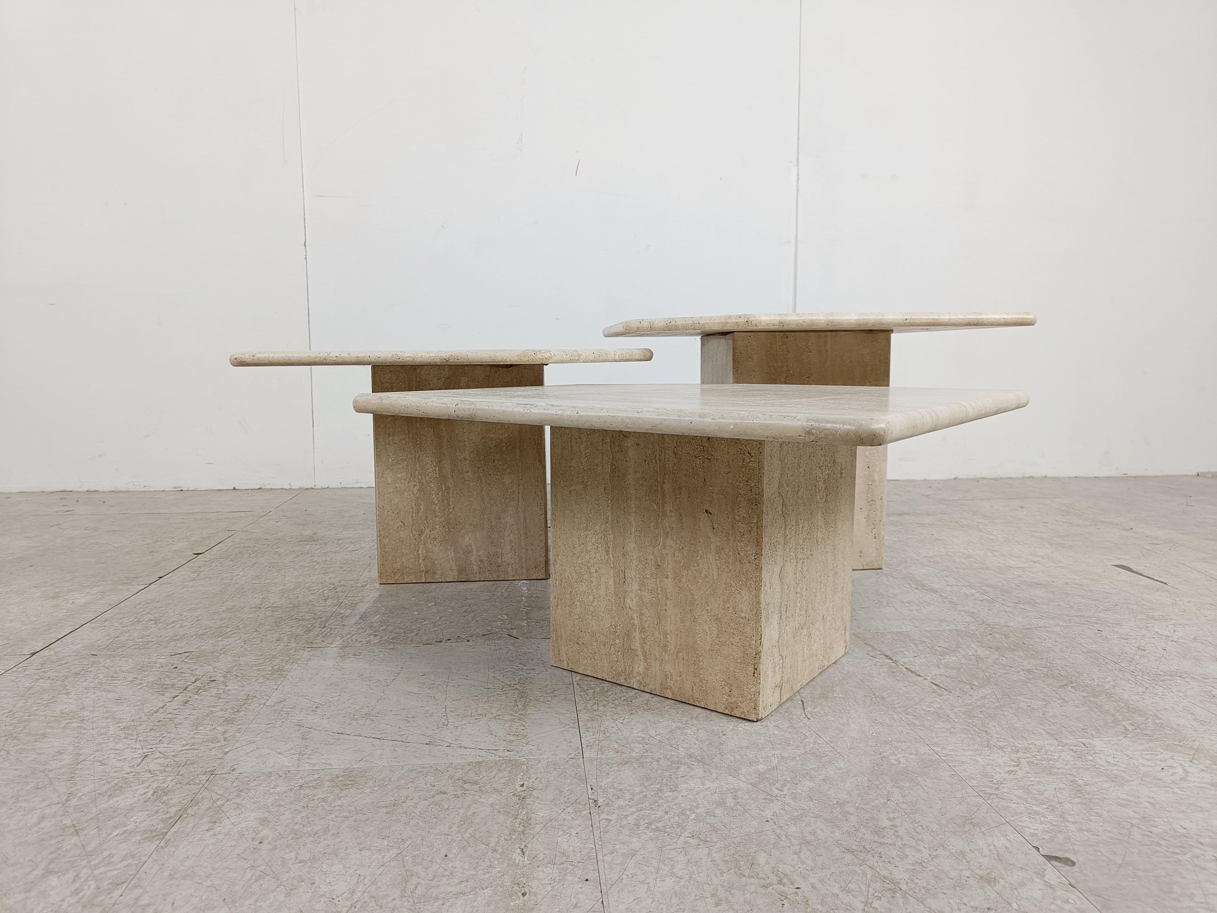 Set of 1970s italian travertine stone nesting tables or side tables.

The tables can be set up in different compositions. Timeless items.

Beautiful colour.

Very good condition

1970s - italy

Dimensions:
Largest table: 60*60*40 cm 

Ref.: