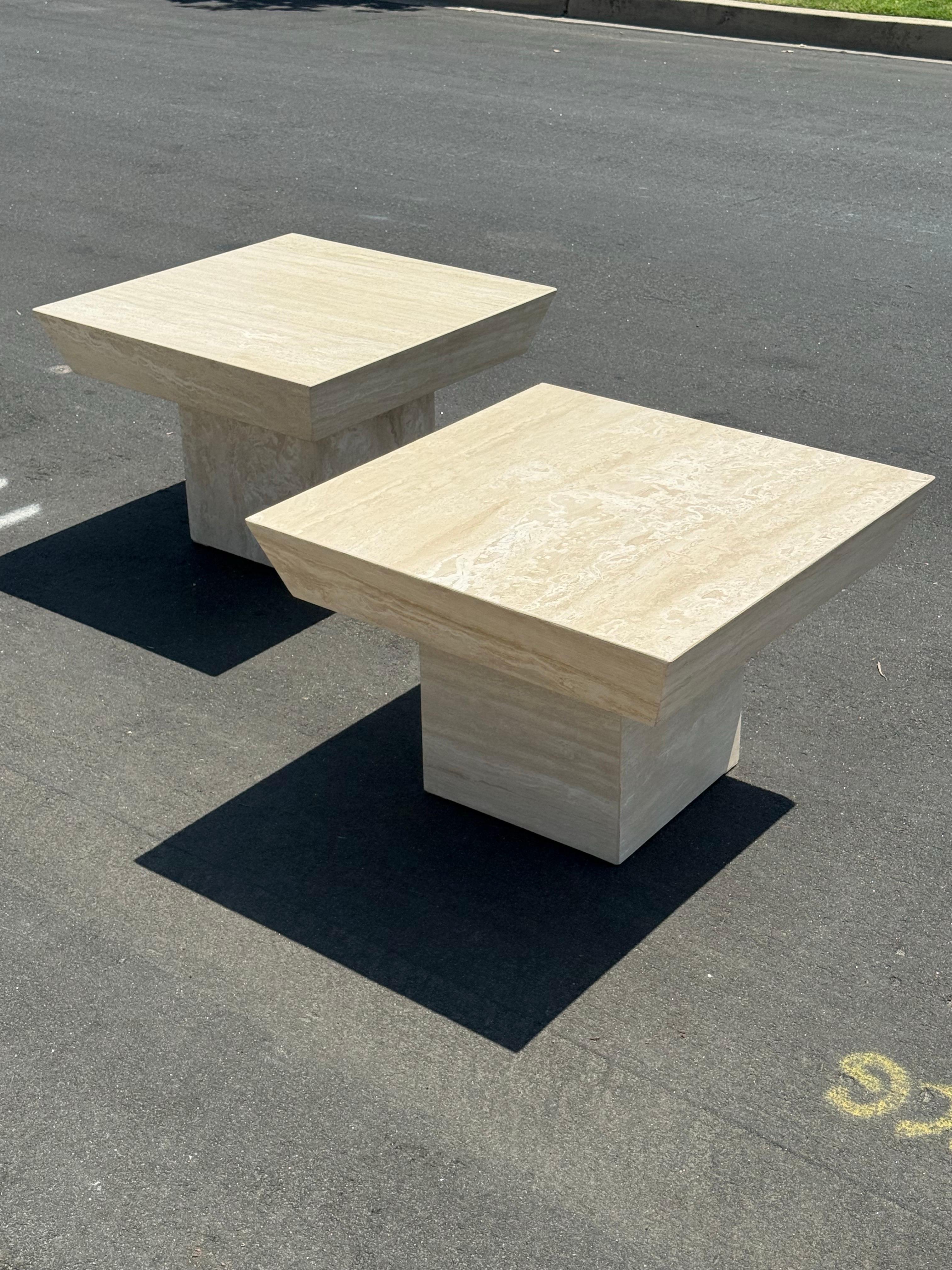 Stunning pair of vintage travertine stone tables. The contrast in grain on these is beautiful. They can be used side by side as a coffee table, or side tables 