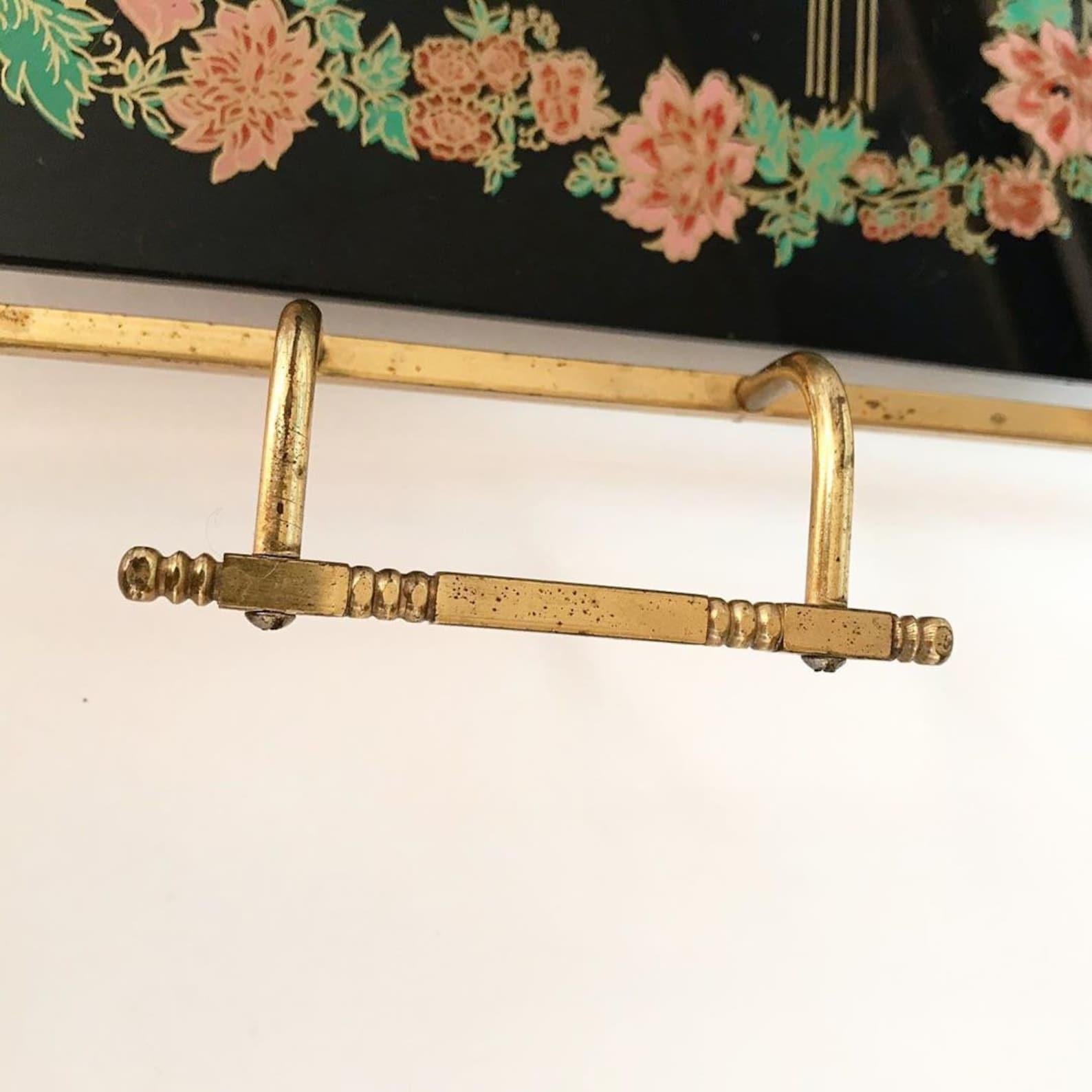Beautiful elegant antique tray with handles. 

The frame is made of brass. 

The base is glass. 

The legs are unscrewed. 

Good antique condition, no chips. 

Sizes: 14.5 x 9.8 inch (37 cm ? 25 cm) - (sizes of glass part). 

Length of