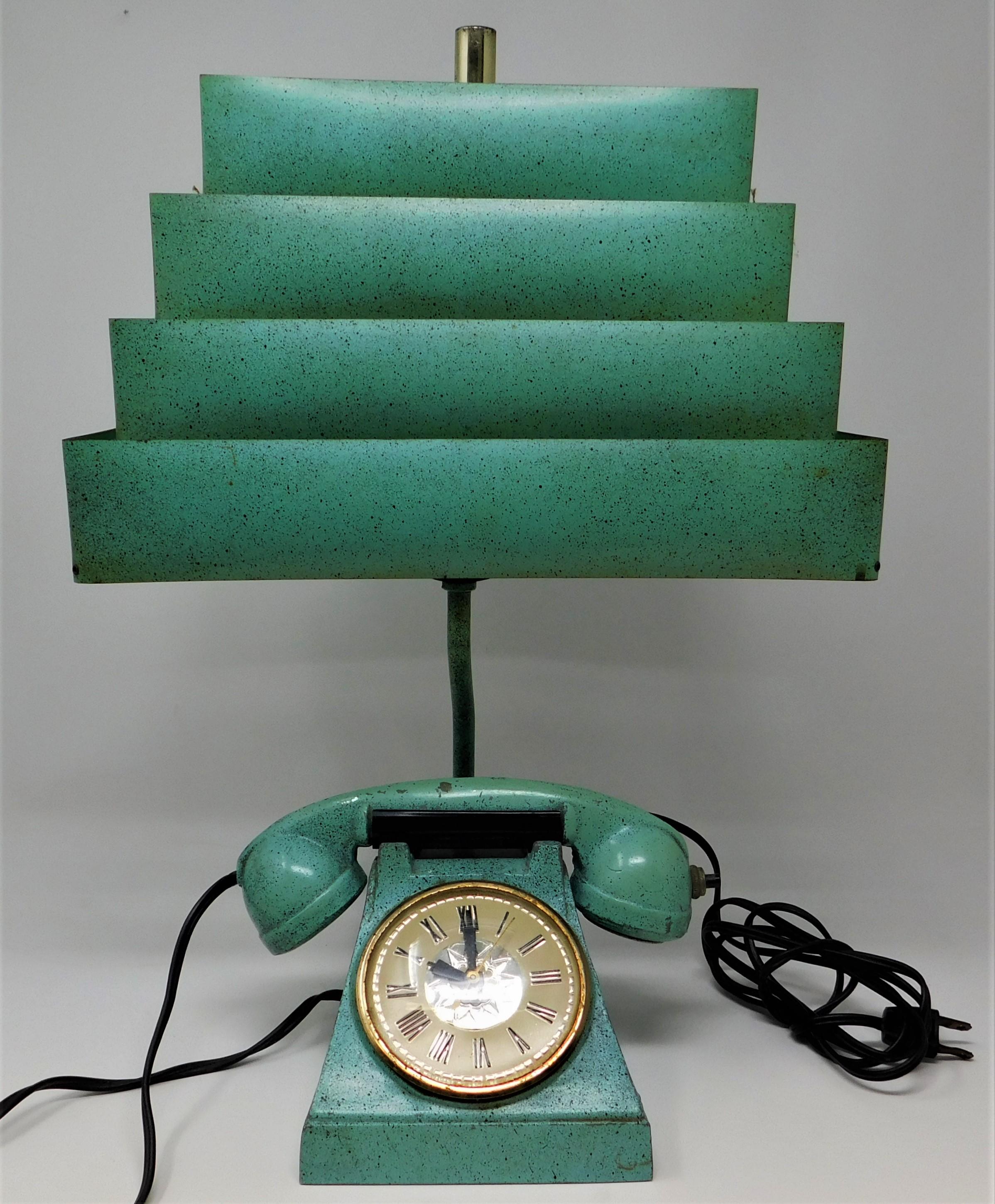 Rare Mid-Century Modern late 1940s or early 1950s retro kitsch décor vintage lamp with multiple personalities, it looks like a telephone, but it's really a table/desk clock and a cigarette/cigar lighter. All topped off with a super cool Venetian