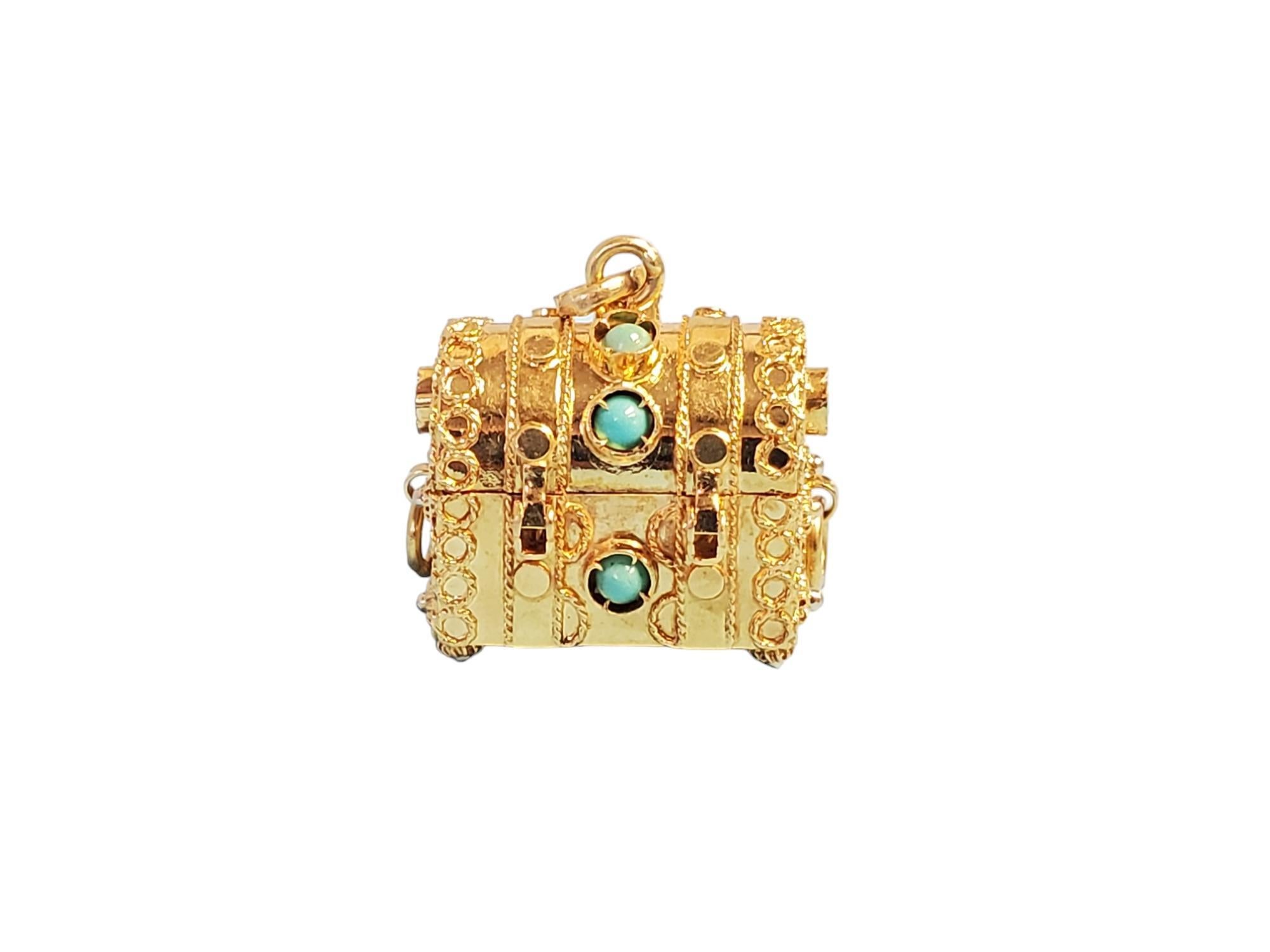 This listing is for a wonderfully maintained 18k yellow gold vintage treasure chest pendant charm that opens and closes securely. 
Its is very good condition and ready to be worn. Its stamped 18k on the bale and has been tested for fineness. 
The