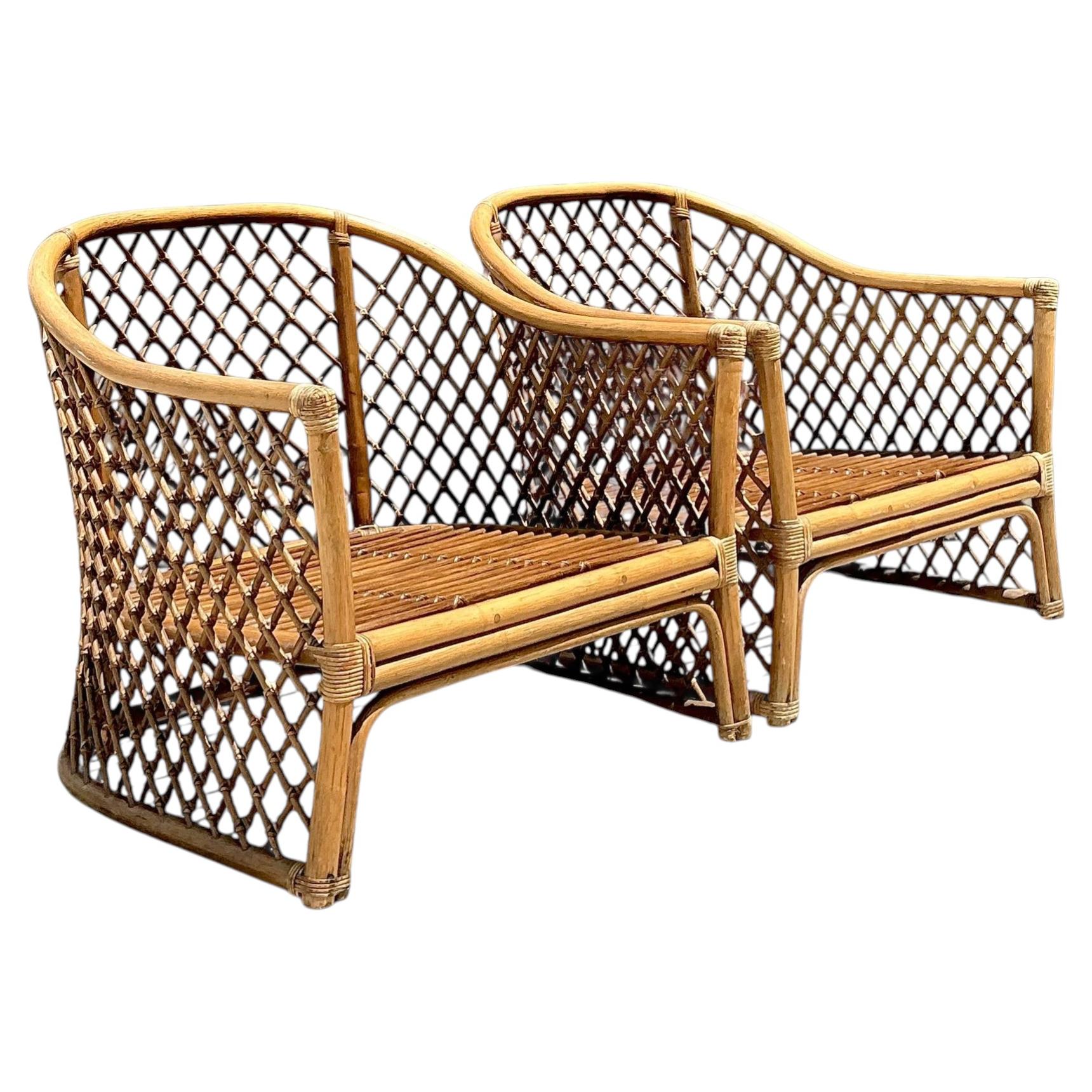 Paire de chaises longues vintage en rotin treillis