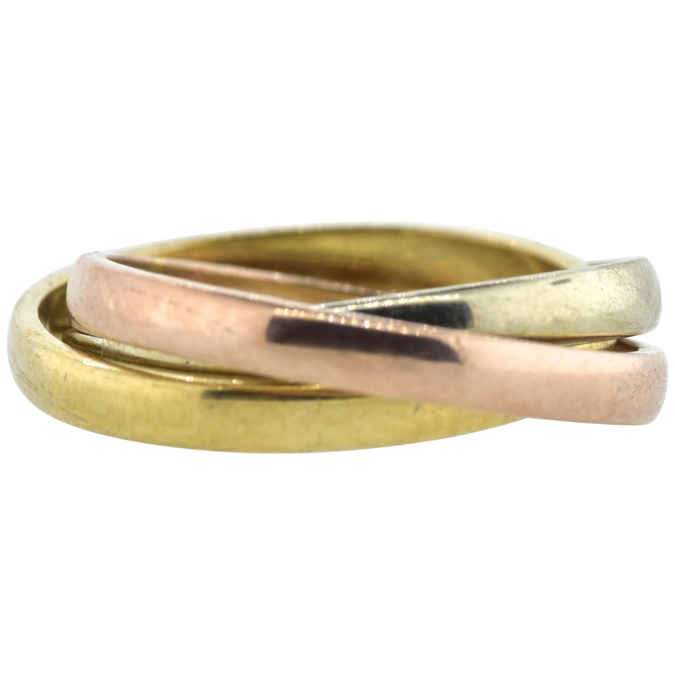 Yellow, pink and white gold rolling ring, this type of 