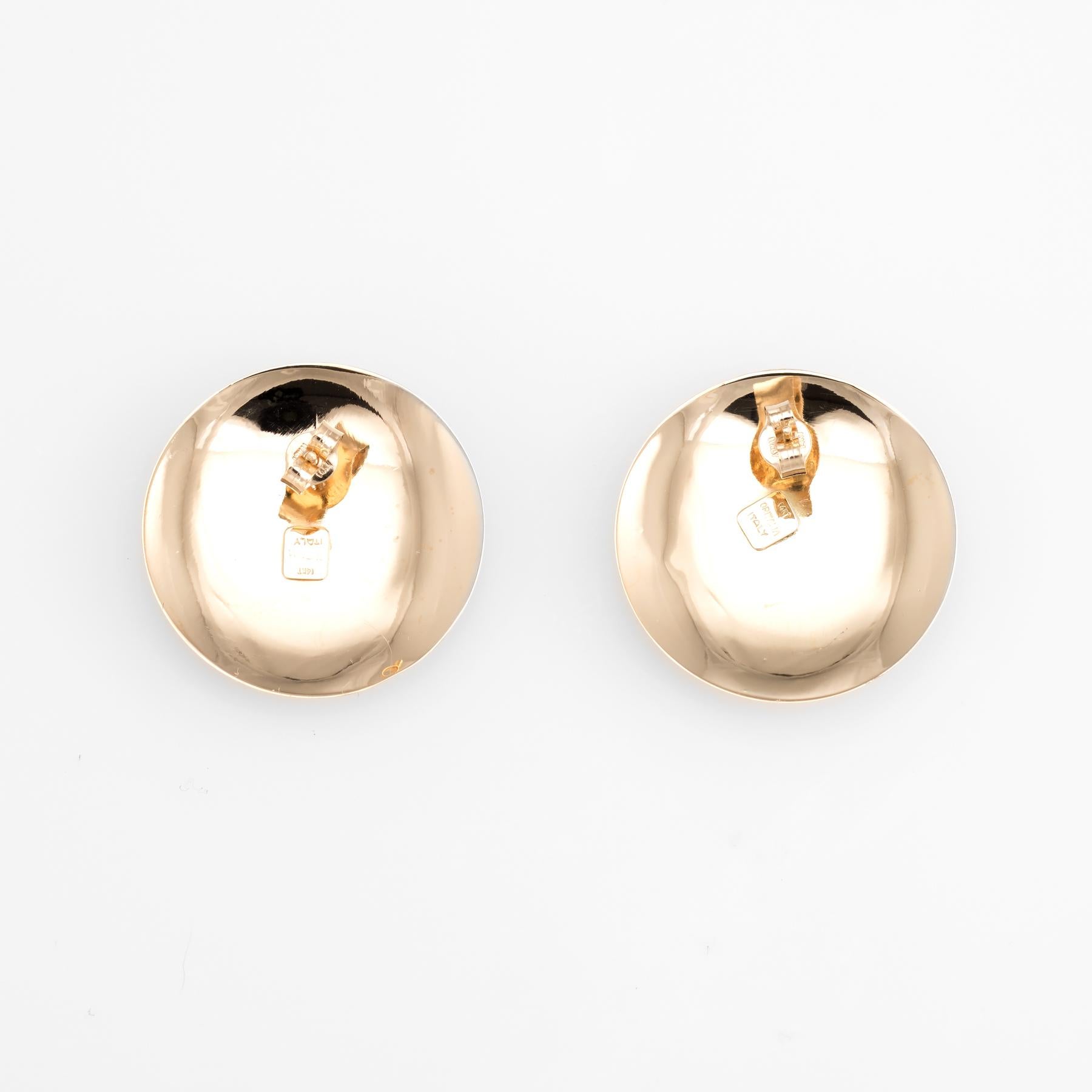 Elegant pair of vintage earrings (circa 1970s to 1980s), crafted in 14k yellow, rose & white gold. 

The round Italian made earrings feature three layers of gold (yellow, white & rose) in an attractive cascading design. A bold pair of statement