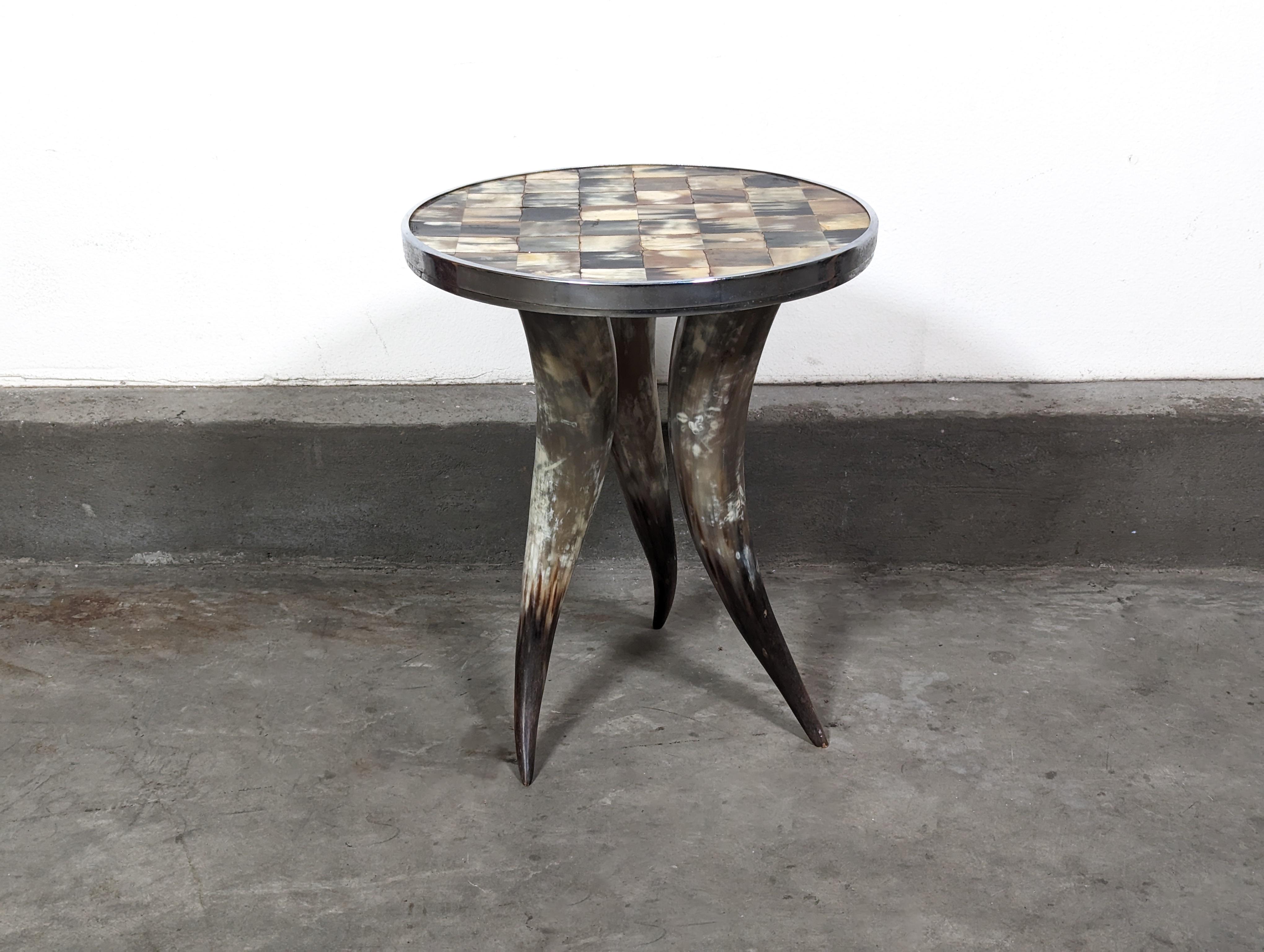Delight in the unique charm of this vintage mid-century decorative side table, a captivating piece that promises to enhance your living space with its distinctive character and dual functionality. Manufactured in the 1990s, this exquisite table