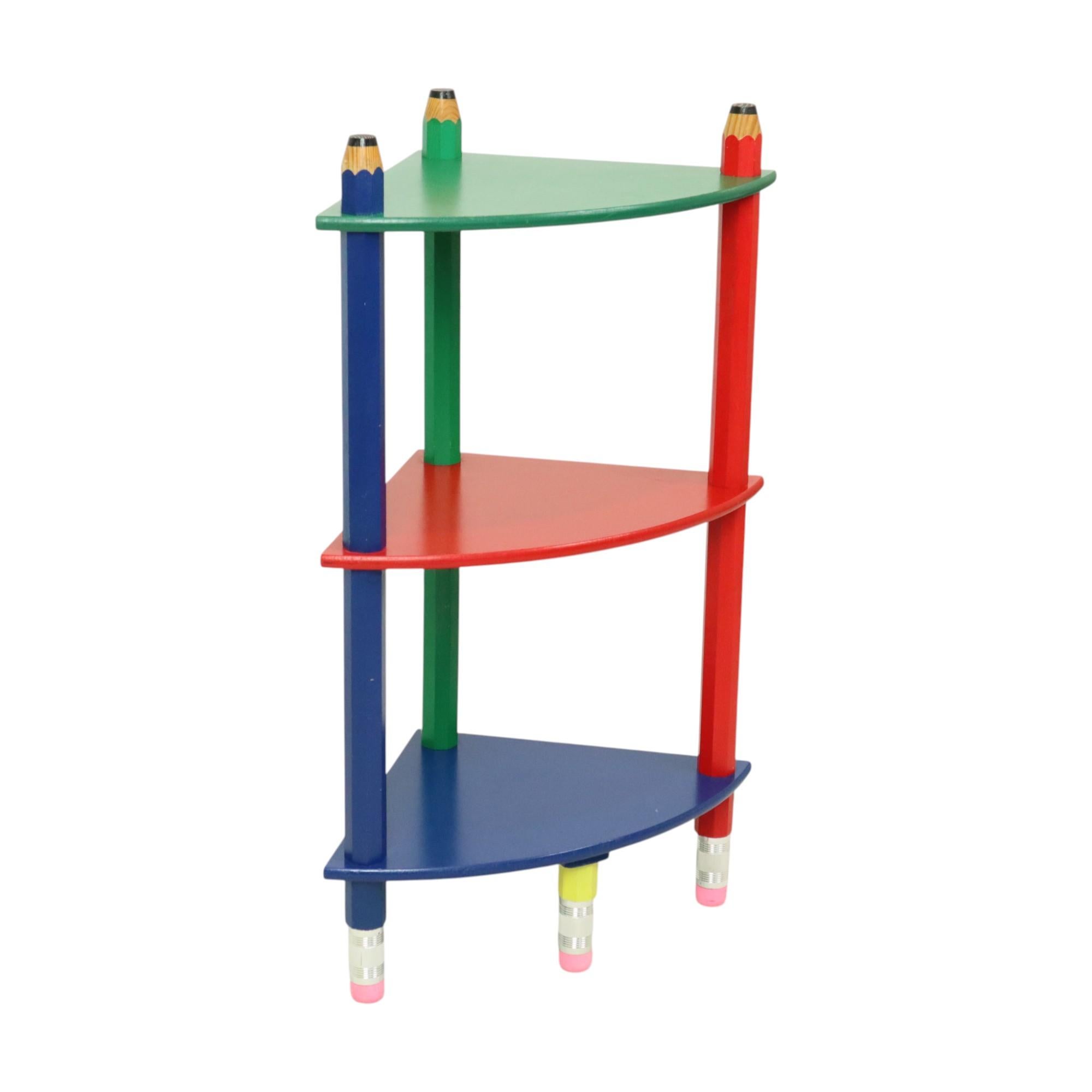 Vintage triangular rack with 3 shelves, made of lacquered wood. The design is attributed to the French designer Pierre Sala, 1980s, France.

Very sturdy and solid. The pencils are threaded together and are highly detailed, making them look like real