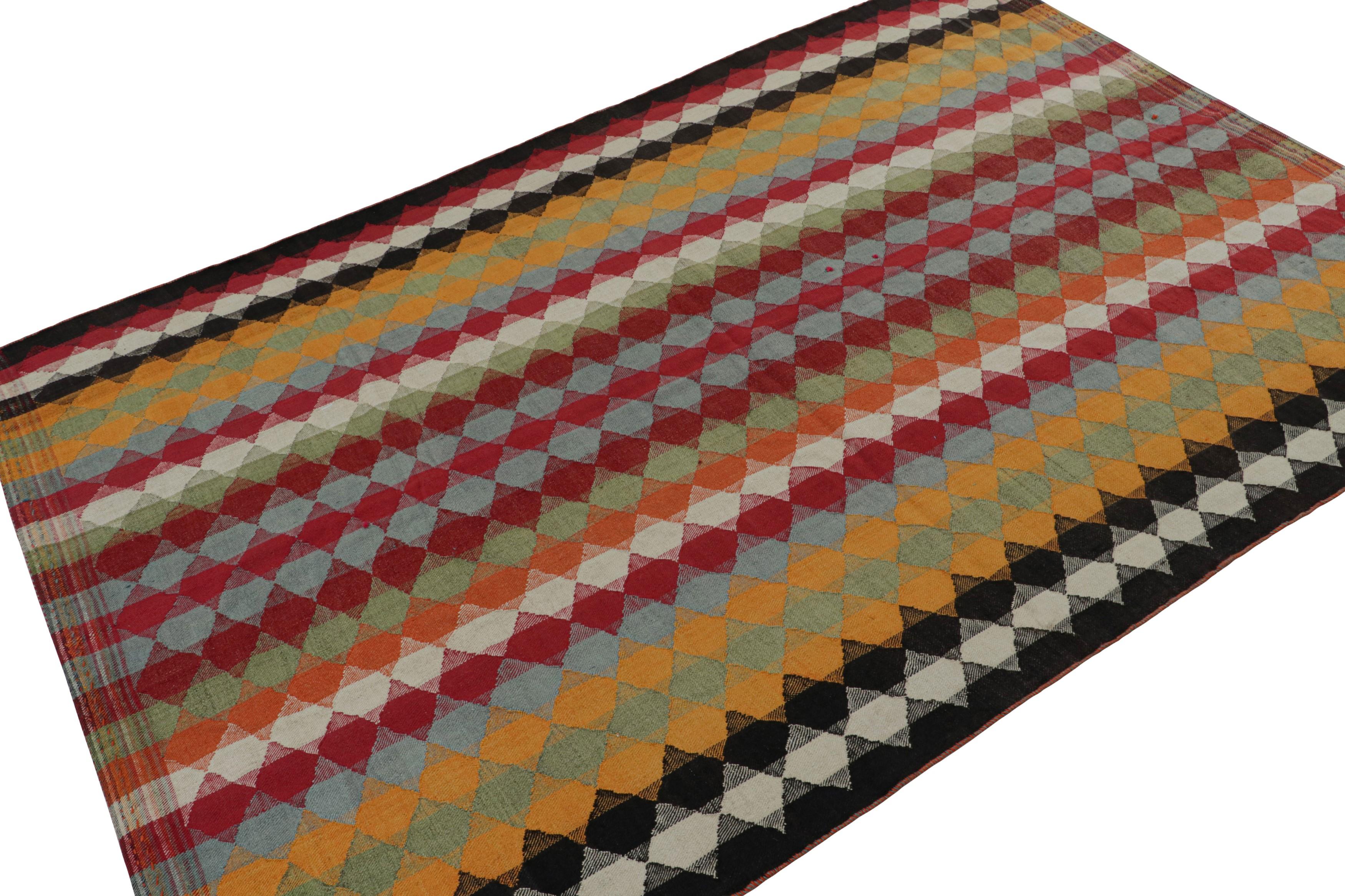 Handmade in wool, circa 1950-1960, this 5x7 vintage tribal Afghan Kilim rug in red, features a play of stripes and diamonds in its particular geometric pattern in hues of red, blue, silver/gray, and yellow. 

On the Design: 

Connoisseurs will