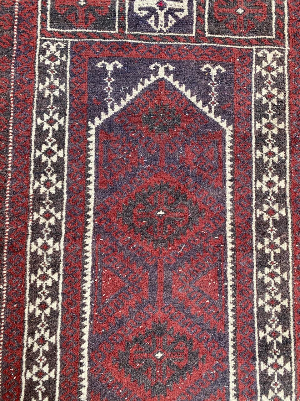Nice midcentury Baluch rug with a nice design and beautiful colors, entirely hand knotted with wool velvet on wool foundation.