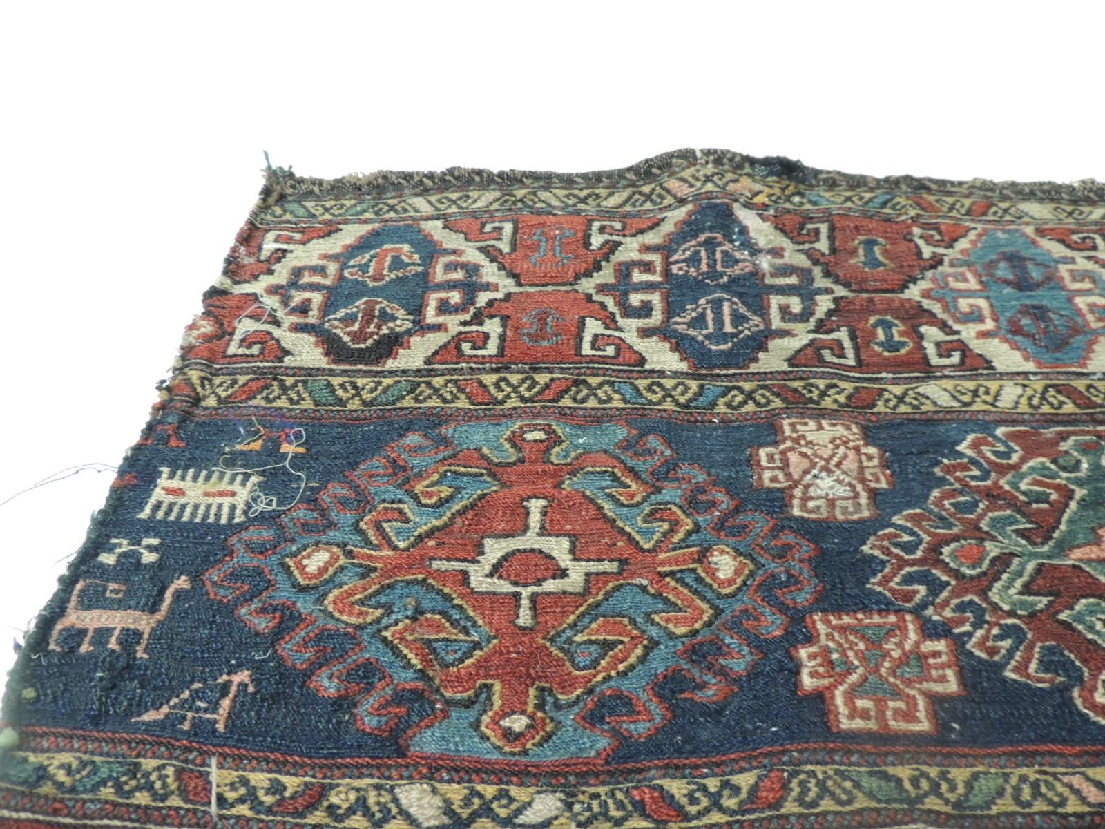 Vintage tribal design Kilim Rug - Grain Sack fragment
Vintage Shahsavan fragment of a Kilim rug in the front, and traditional Anatolian kilims all around. This piece is a Soumak which is a term used for weft wrapping weaving technique and it is