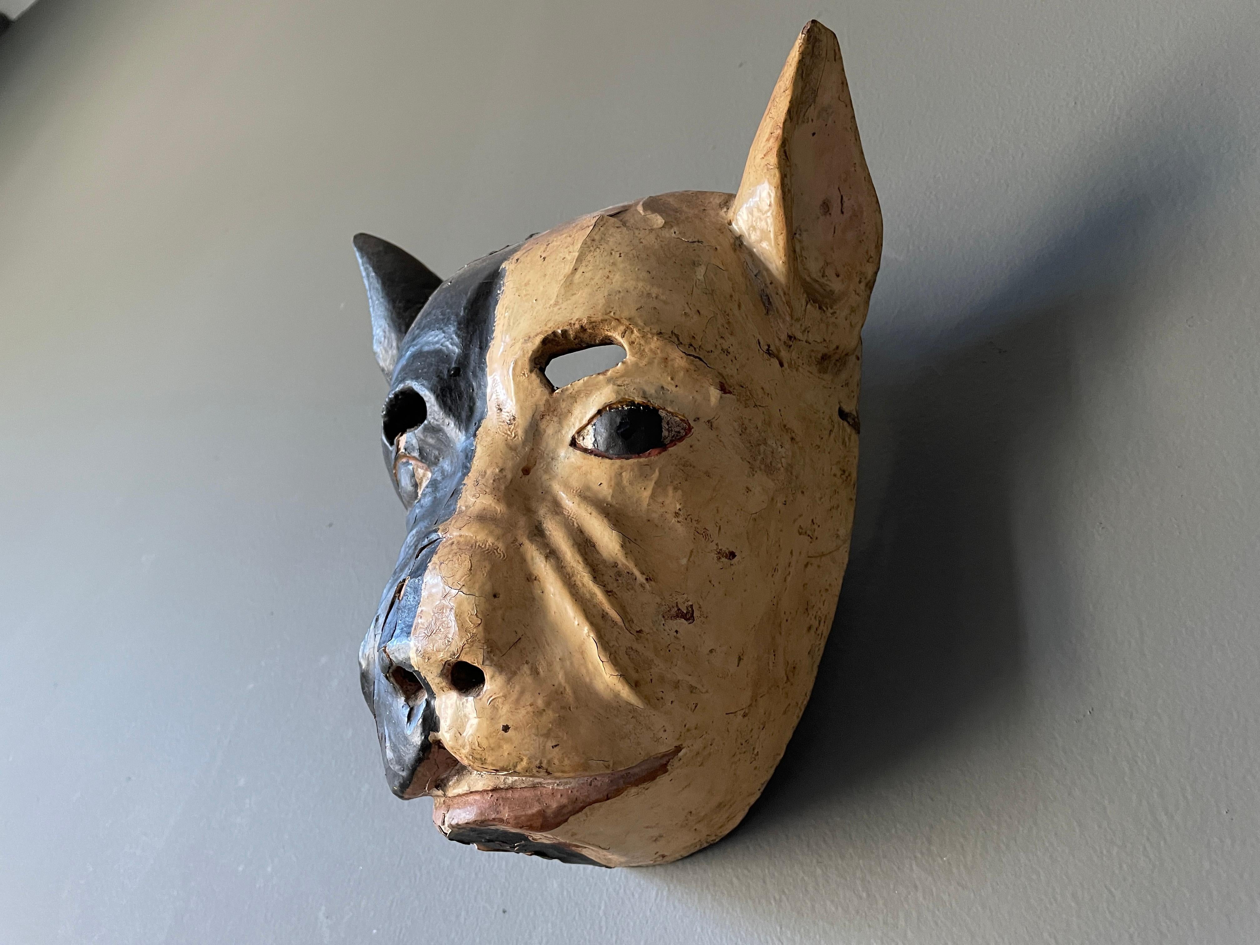 Vintage hand carved dog head mask. Unique style, very detailed. A wonderful accent piece for any room.